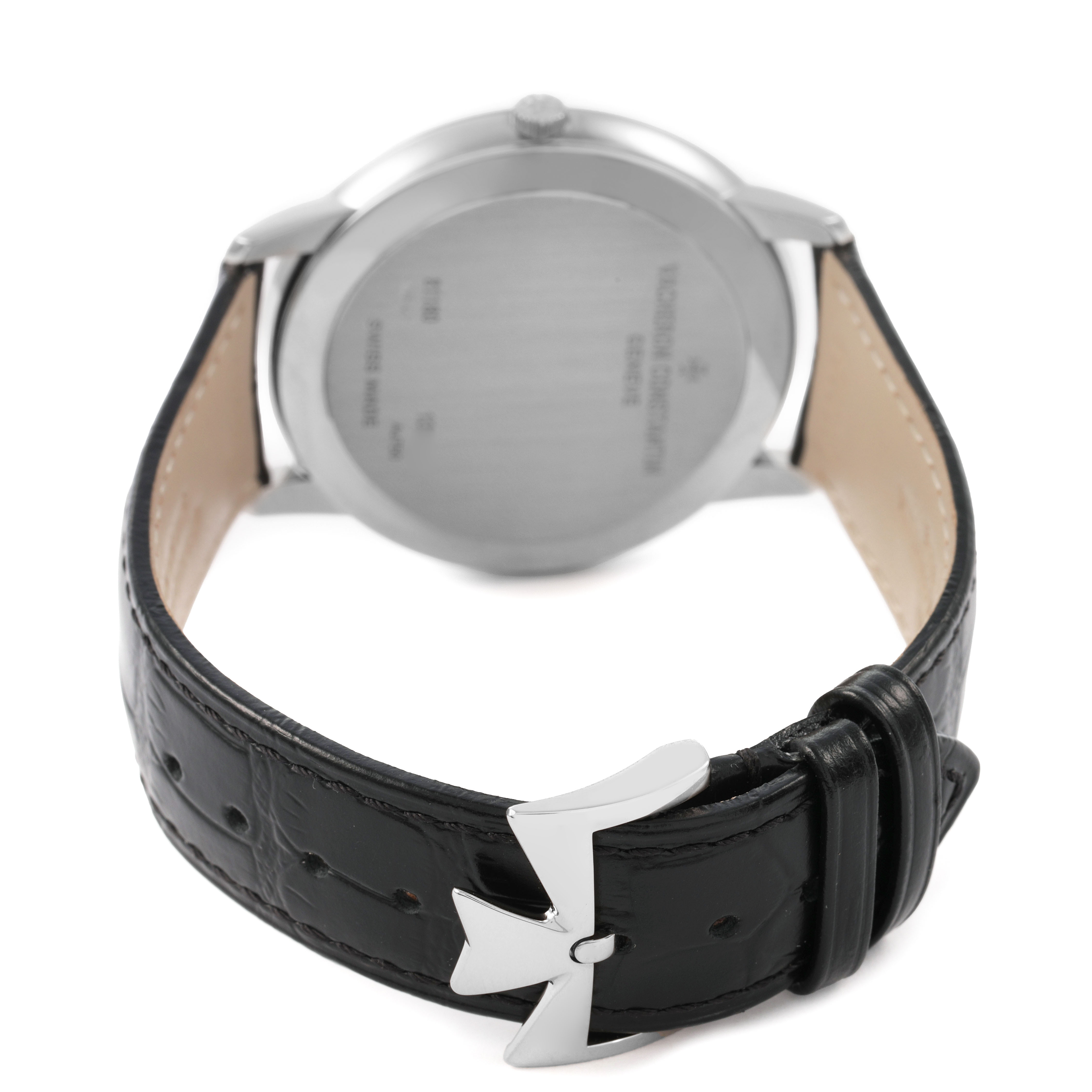 The image shows the back view of the Vacheron Constantin Patrimony 81180/000G-9117 Men's White Gold Silver Dial watch, highlighting the case back and leather strap with a clasp.