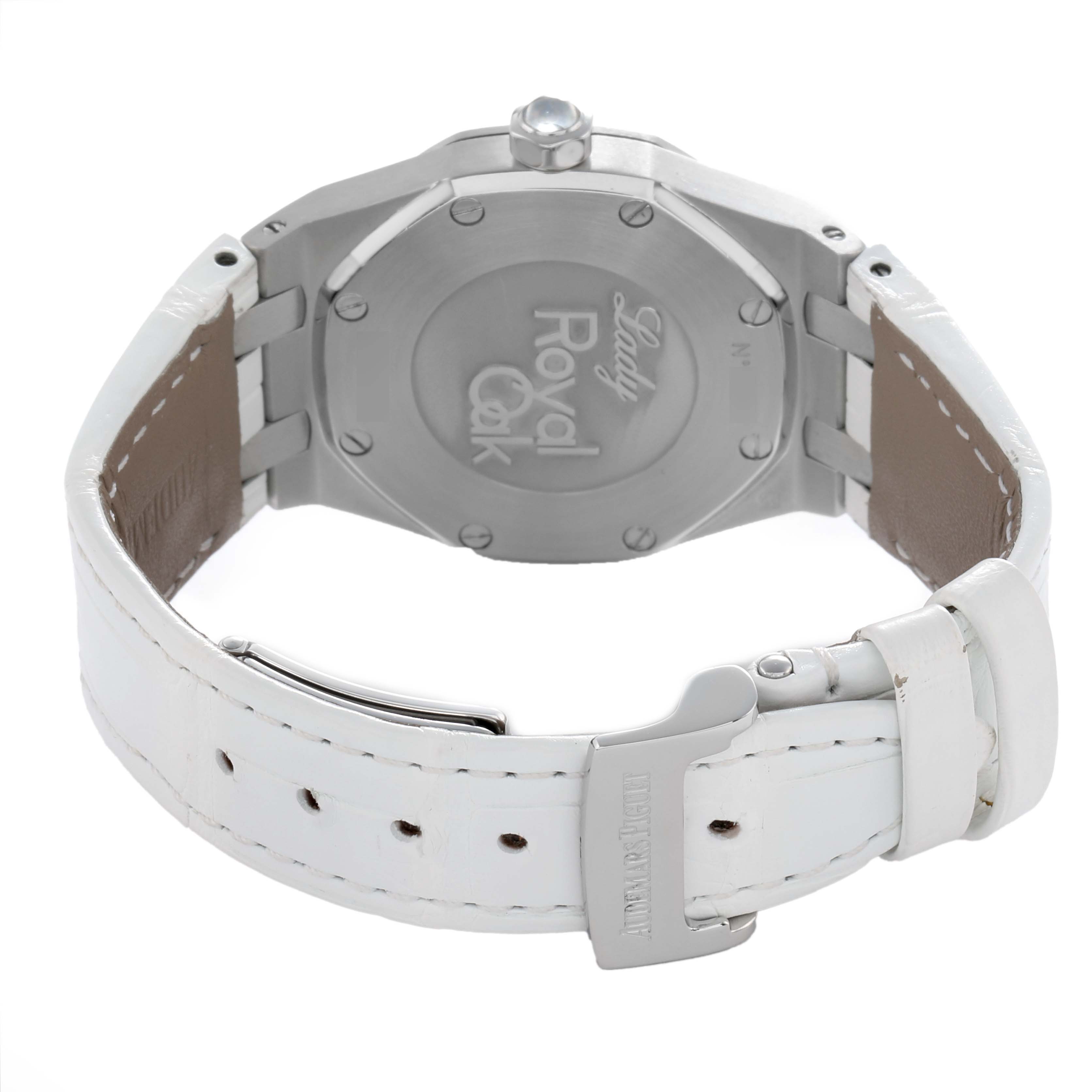 The image shows the back of an Audemars Piguet Royal Oak 67601ST Women
s Stainless Steel Silver Dial watch with its white strap and clasp.