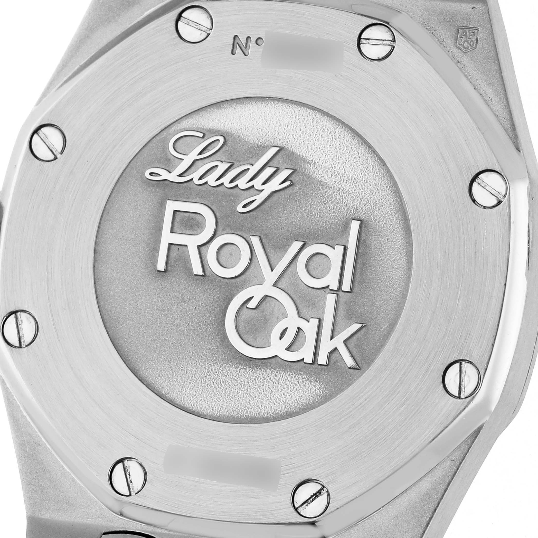 The image shows the back of a Royal Oak model by Audemars Piguet, highlighting the case back and screws.