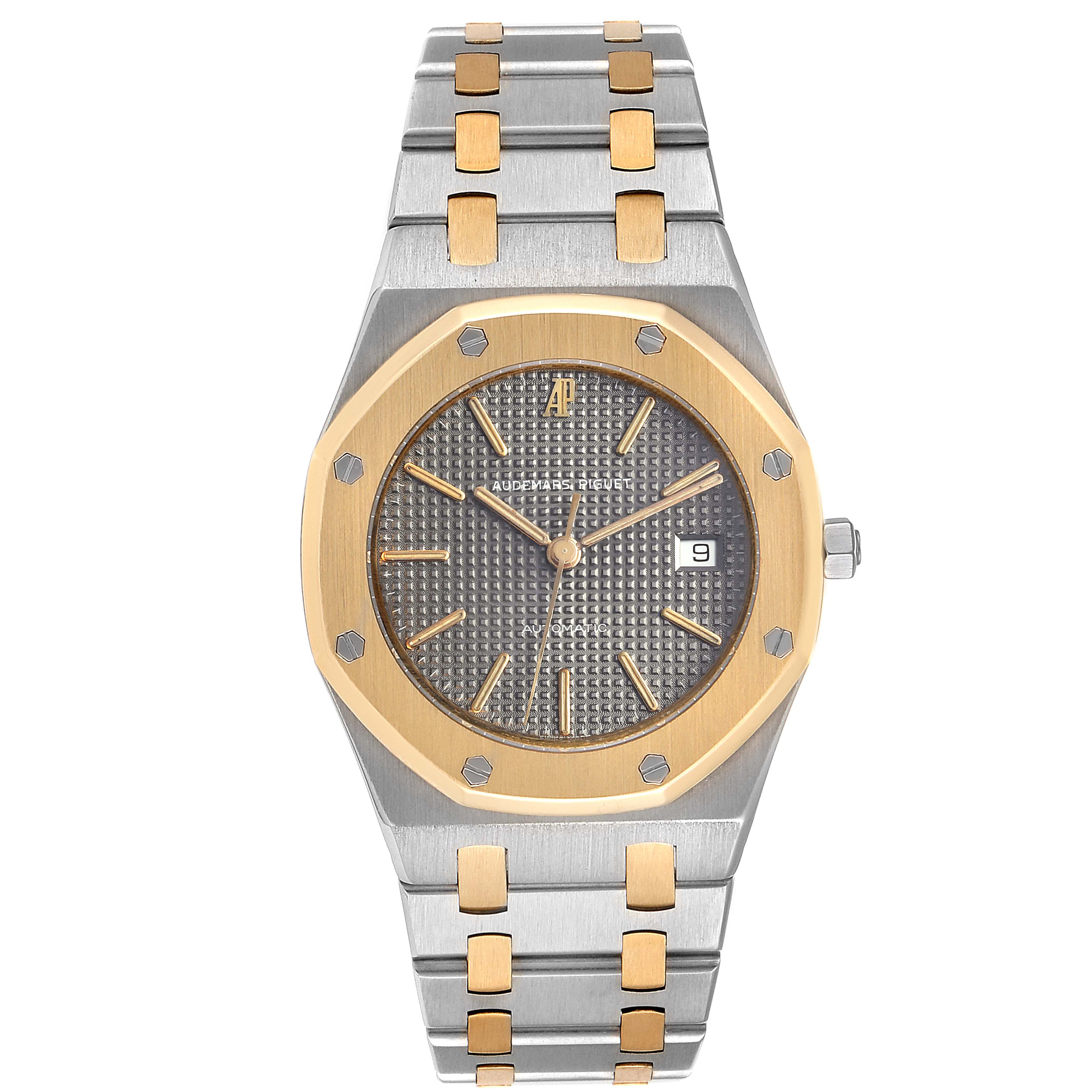 This image shows a frontal view of an Audemars Piguet Royal Oak SA14486 Men's Steel and Gold (two tone) Grey Dial SA14486 Men's Steel and Gold (two tone) Grey Dial watch, highlighting the dial, bezel, and bracelet.