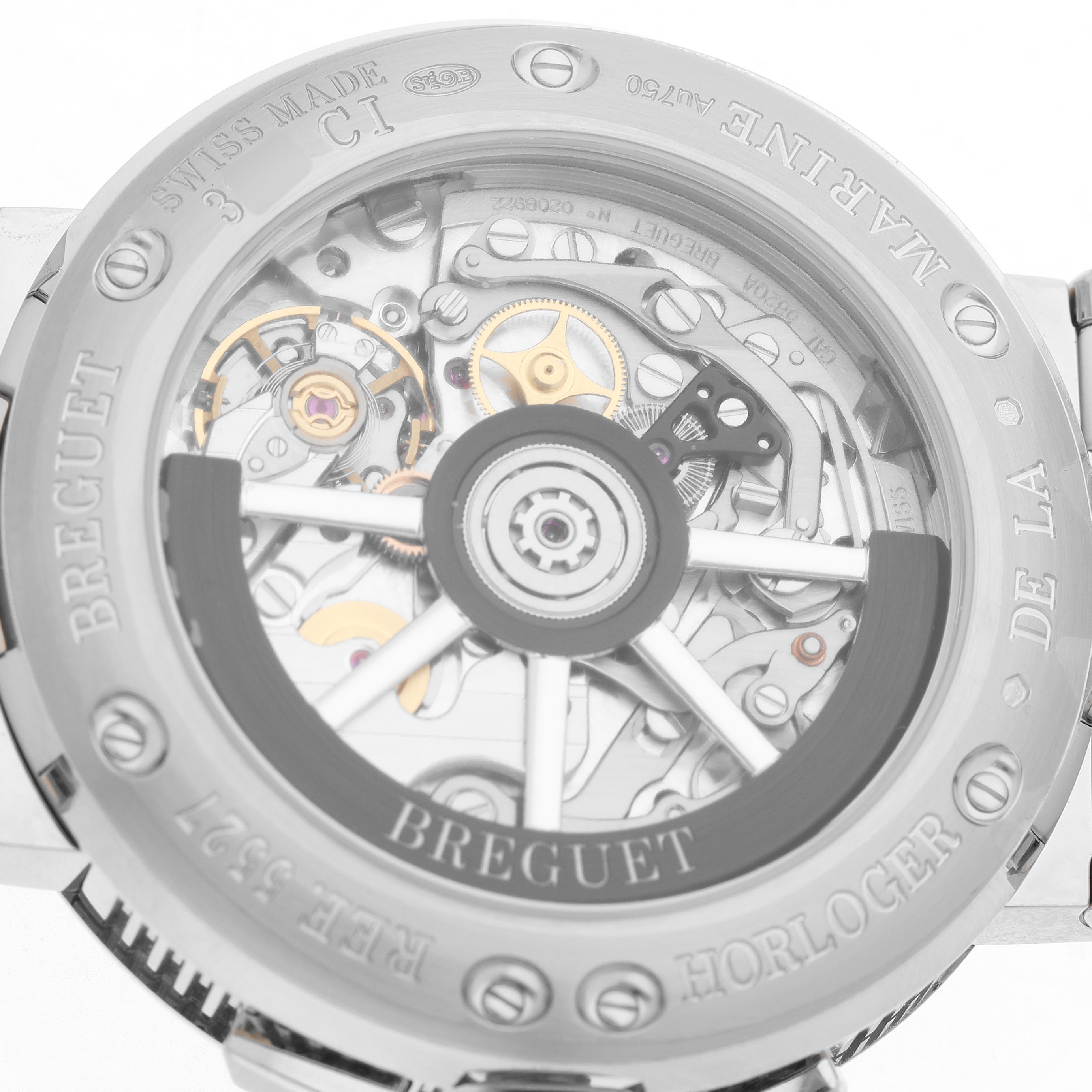 The image shows the back view of a Breguet Marine 5527BB Men's White Gold Blue Dial model, highlighting the intricate movement and rotor.