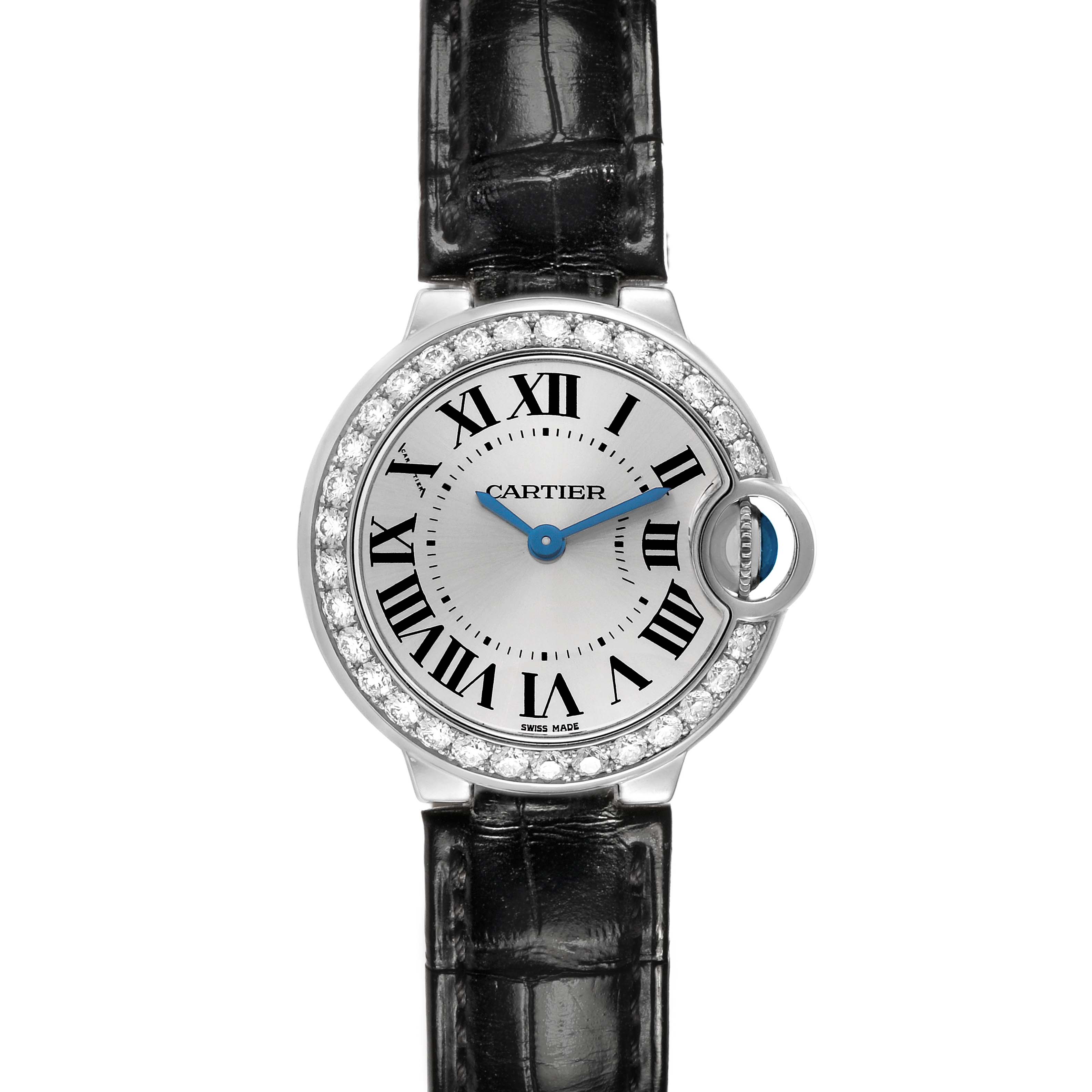 The Cartier Ballon Bleu WE900351 Women's White Gold Silver Dial watch is shown from a top-down angle, displaying its face, blue hands, Roman numerals, and diamond bezel.