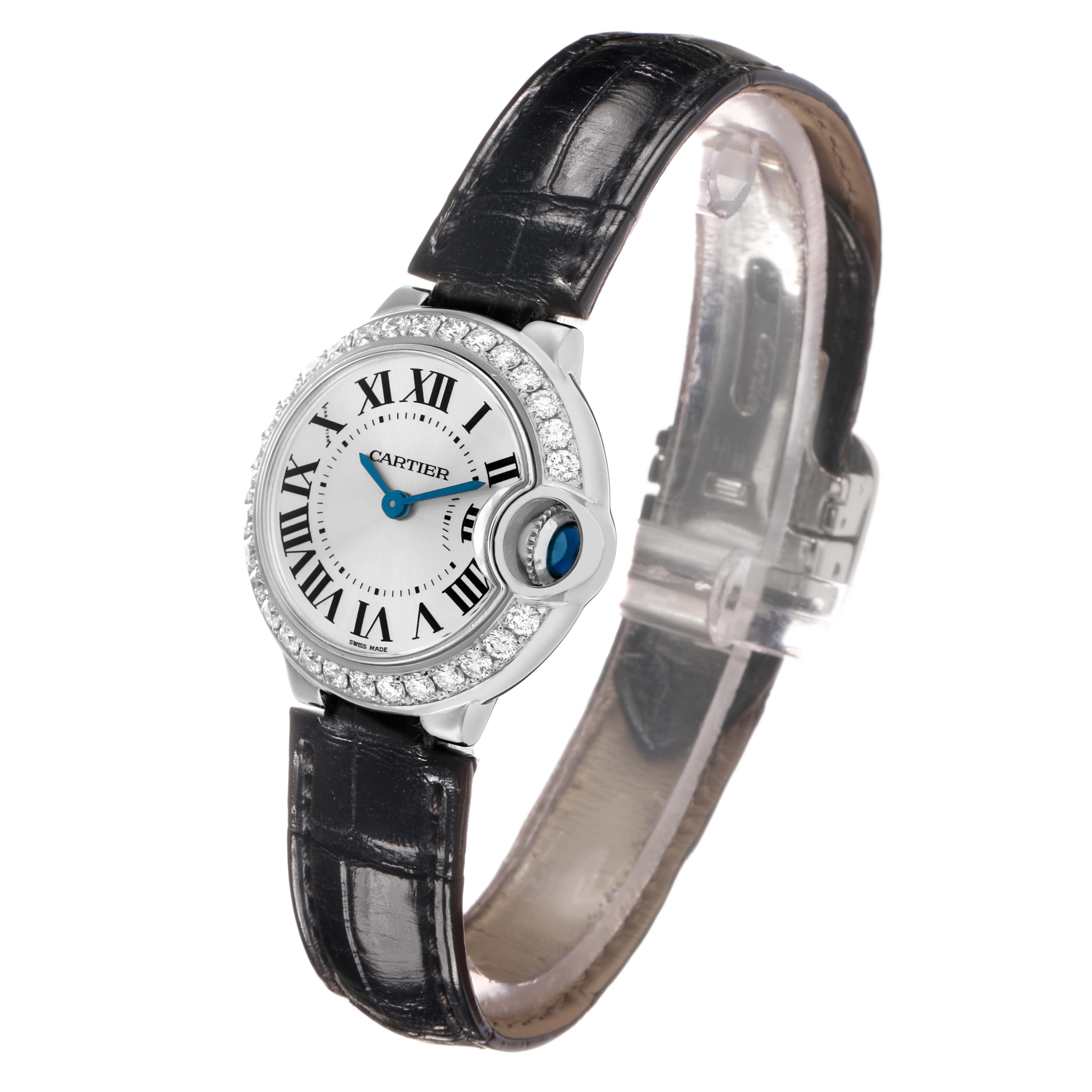 The Cartier Ballon Bleu WE900351 Women's White Gold Silver Dial watch is shown at a slight angle, highlighting its face, bezel, and strap.