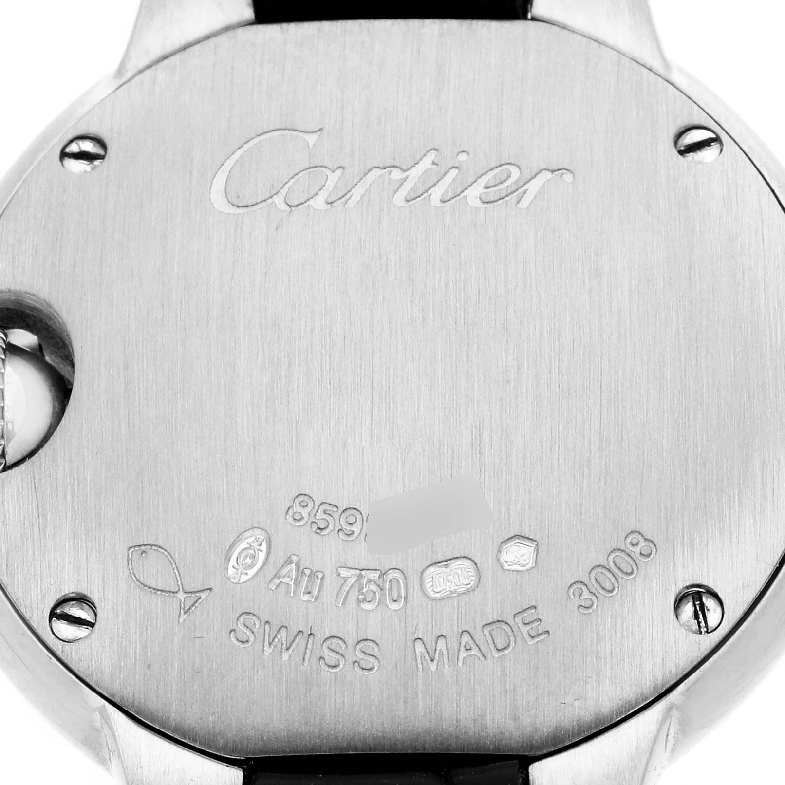 The image shows the back of a Cartier Ballon Bleu WE900351 Women's White Gold Silver Dial watch, highlighting engraving details and hallmark markings.