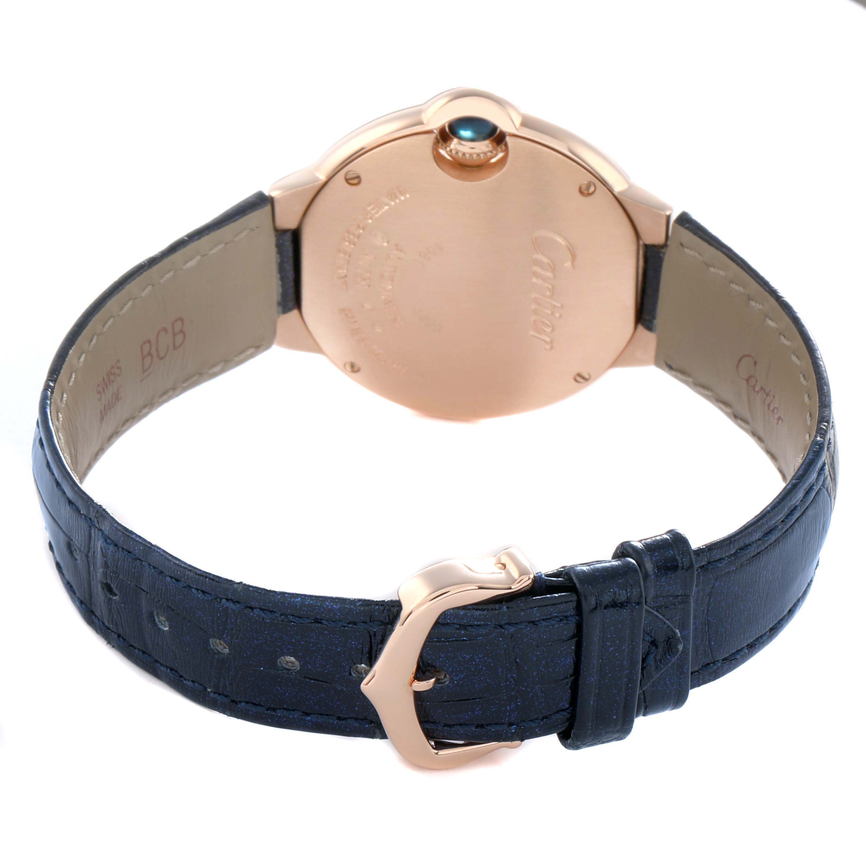 The image shows the back view of a Cartier Ballon Bleu WGBB0052 Women's Rose Gold Silver Dial watch, highlighting the case back, strap, and clasp.
