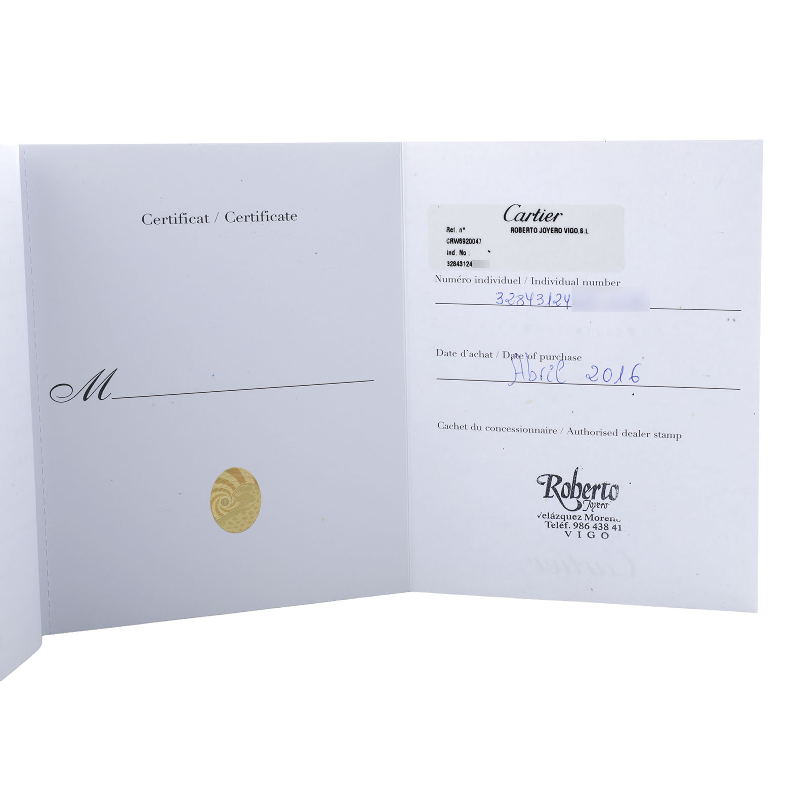 The image shows an open Cartier Ballon Bleu W6920047 Women's Stainless Steel Silver Dial warranty card and certificate booklet, displaying purchase details and dealer information.