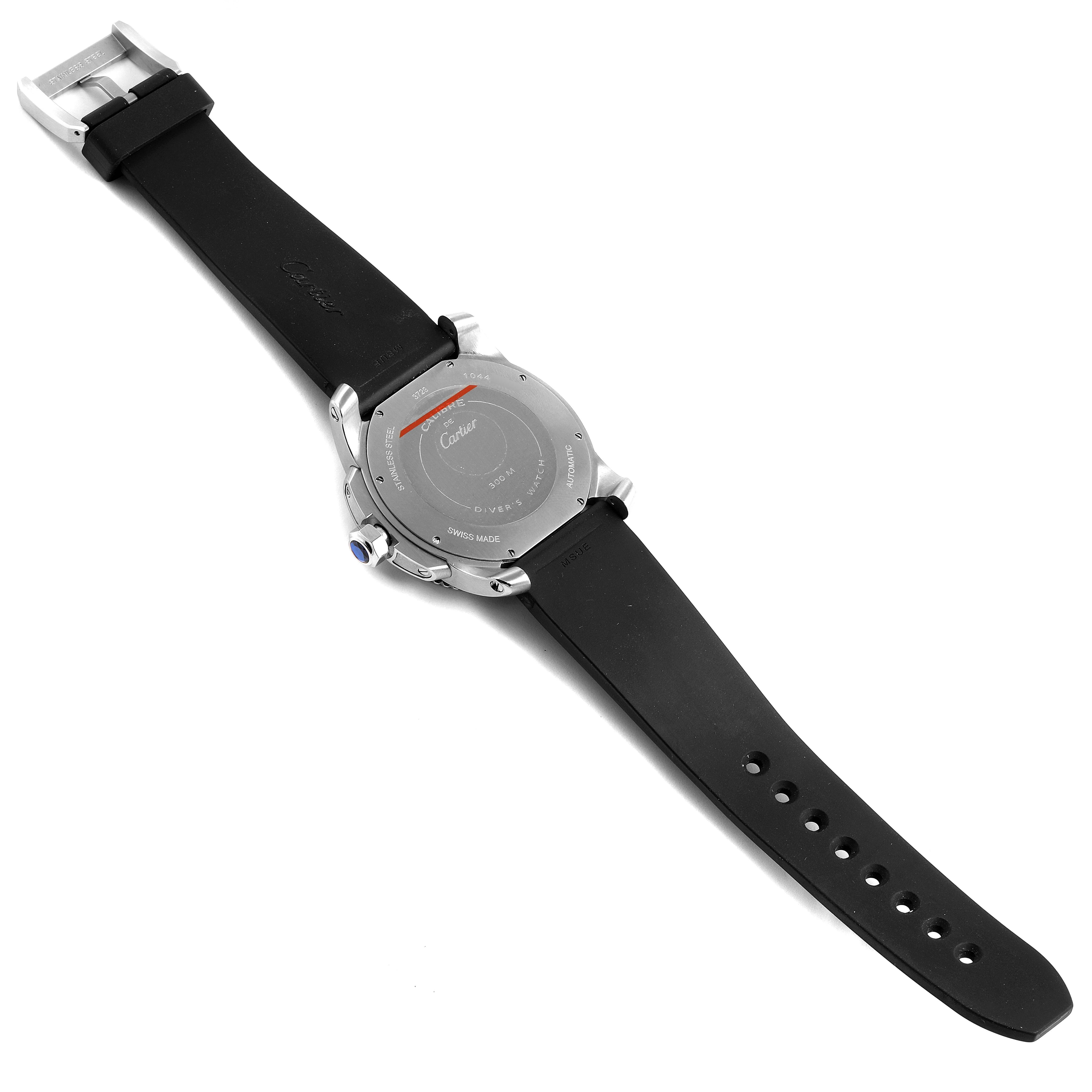 The image shows the back view of a Calibre de Cartier watch by Cartier, displaying its case back, strap, and buckle.