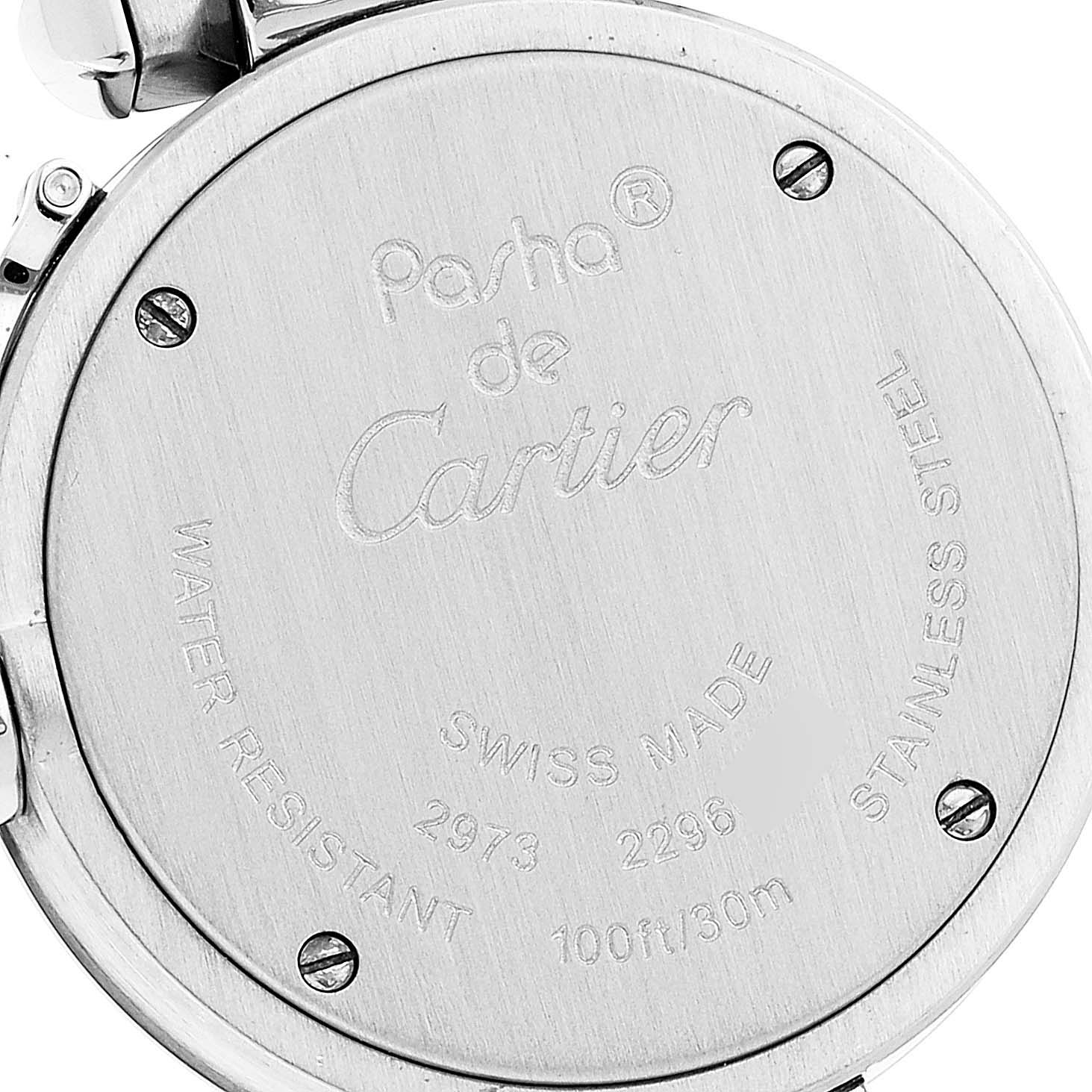 The image shows the back case of a Cartier Pasha W3140007 Women
s Stainless Steel Silver Dial W3140007 Women
s Stainless Steel Silver Dial watch, displaying engravings about model details and water resistance.