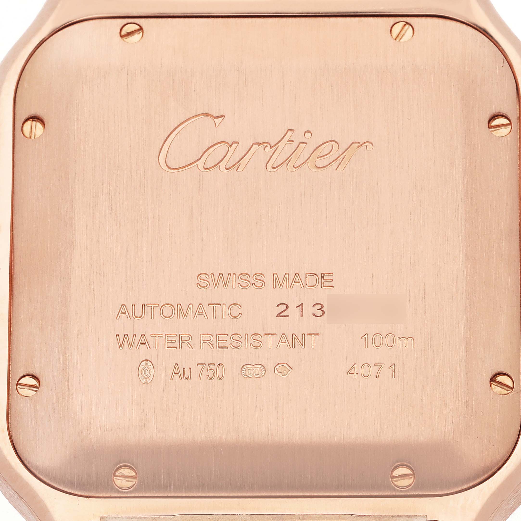 The image shows the back case of a Cartier Santos WGSA0011 Men's Rose Gold Silver Dial WGSA0011 Men's Rose Gold Silver Dial watch with engravings and screws visible.