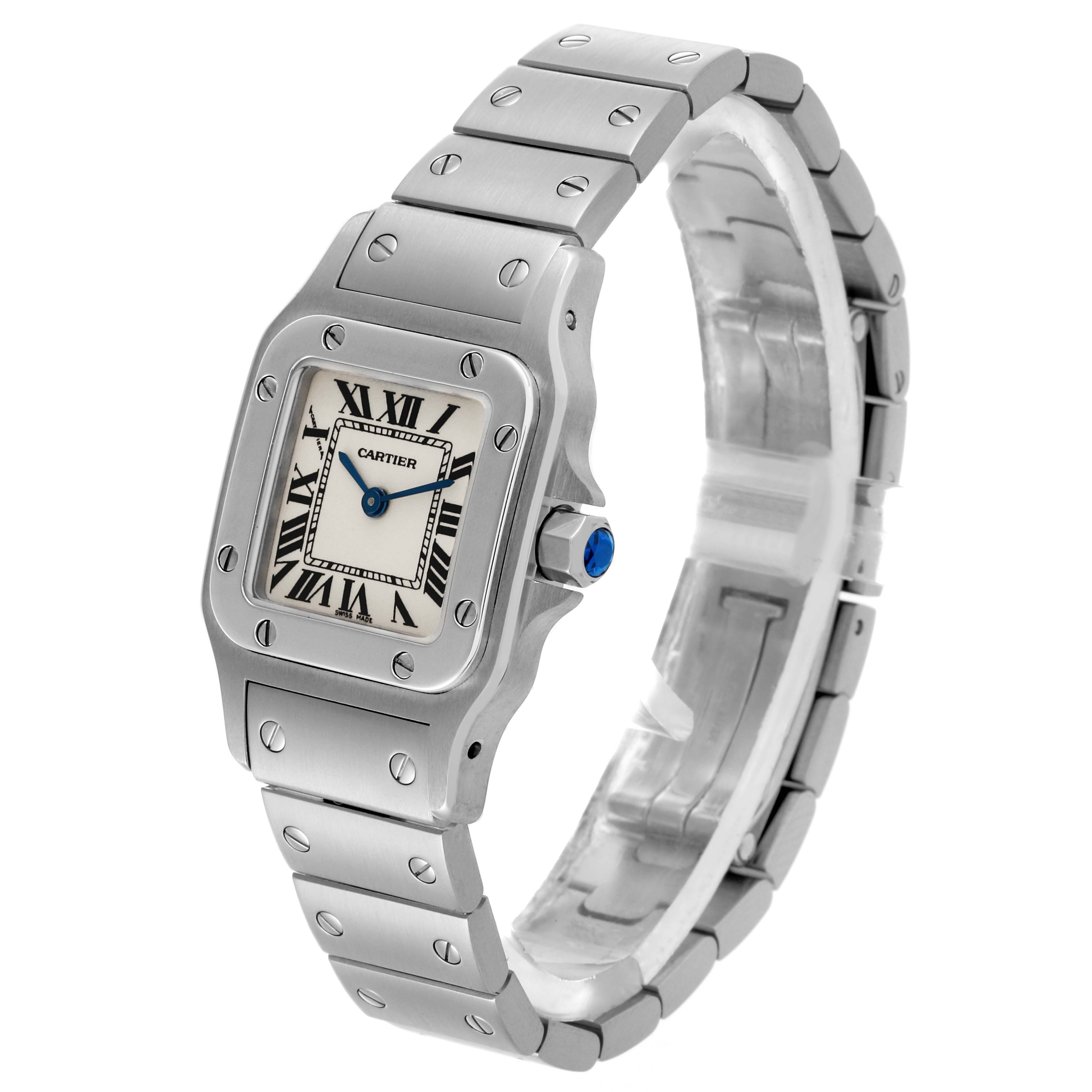 The Cartier Santos W20056D6 Women's Stainless Steel Silver Dial W20056D6 Women's Stainless Steel Silver Dial watch is shown at a three-quarter angle, displaying its case, bezel, dial, and bracelet.