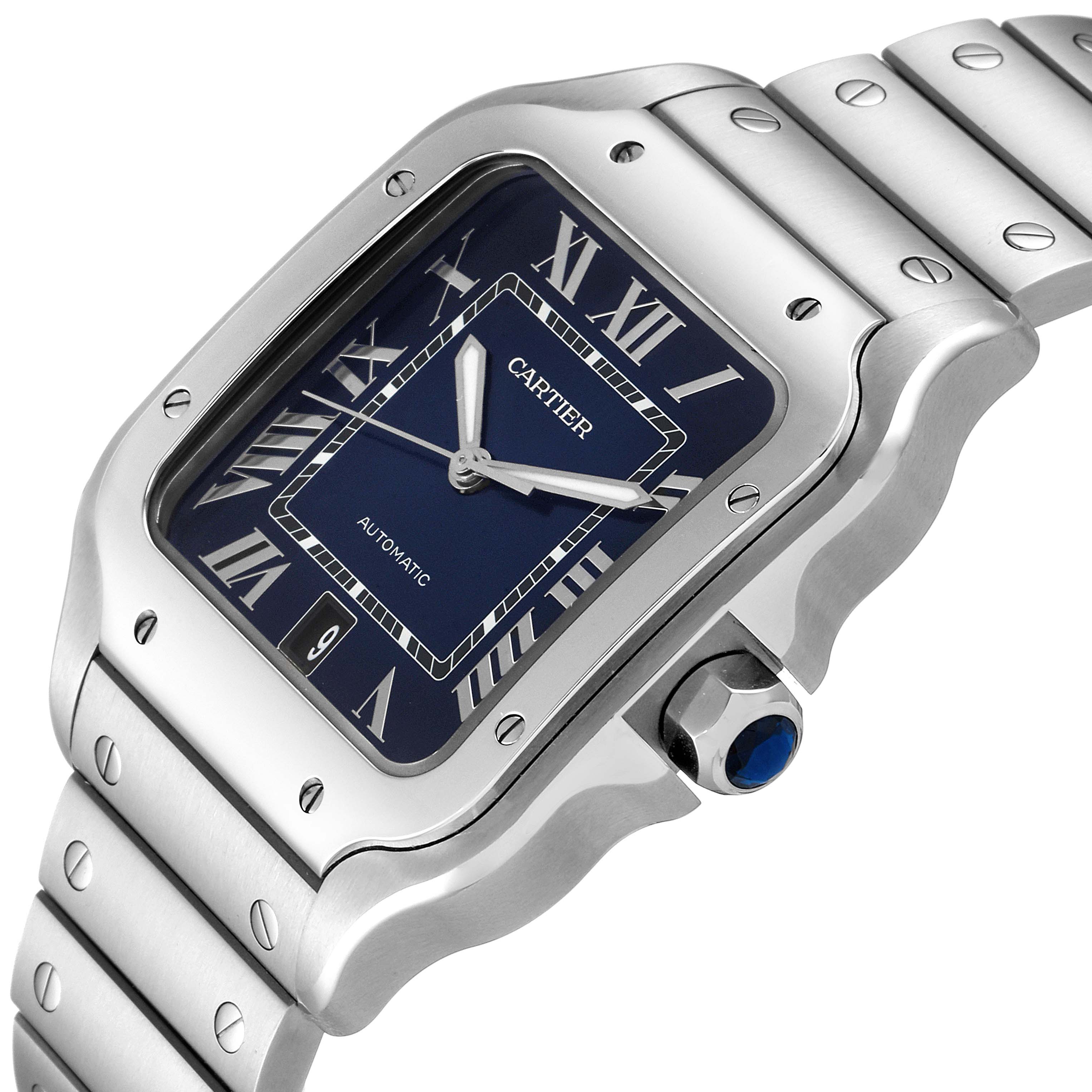 The Cartier Santos WSSA0030 Men's Stainless Steel Blue Dial WSSA0030 Men's Stainless Steel Blue Dial watch is shown at an angled close-up, highlighting its dial, bezel, and part of the bracelet.