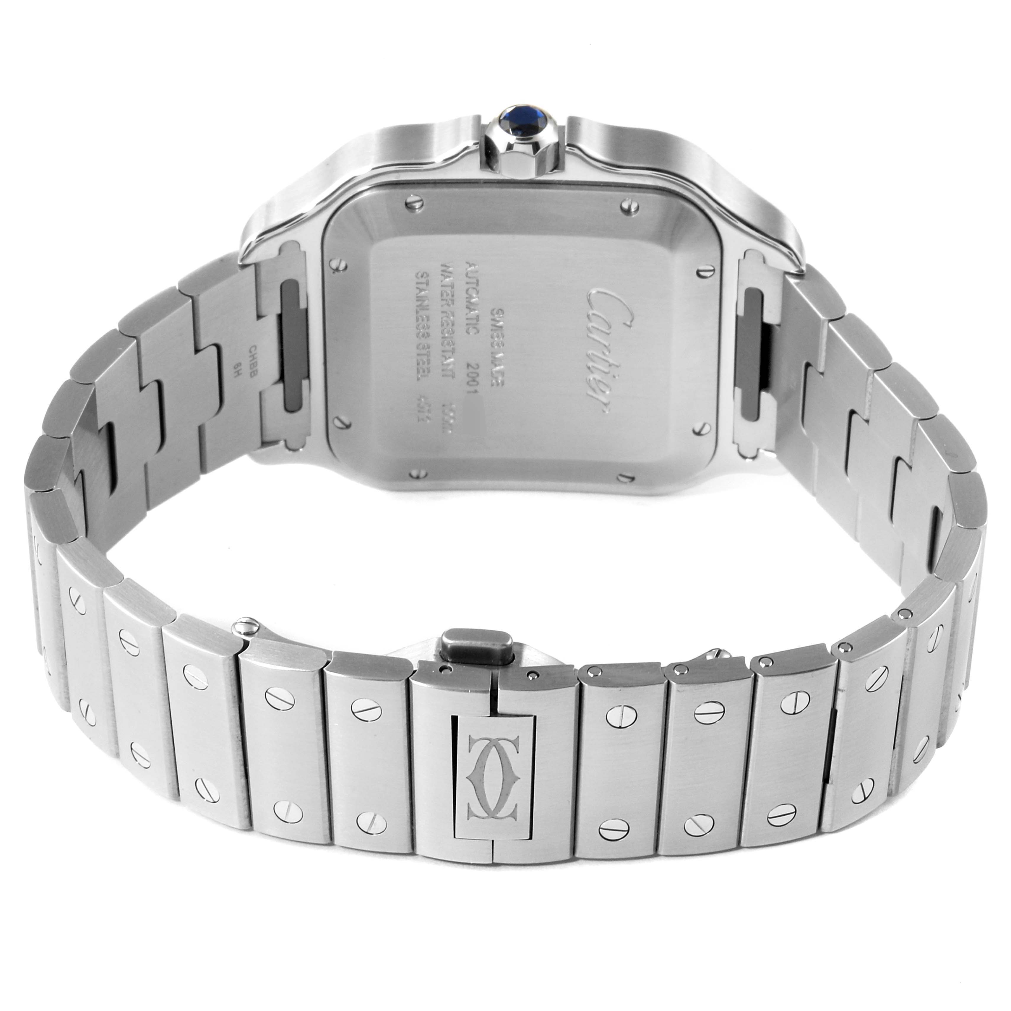 The image shows the back view of the Cartier Santos WSSA0030 Men's Stainless Steel Blue Dial WSSA0030 Men's Stainless Steel Blue Dial watch, including its case back and partly opened stainless steel bracelet.