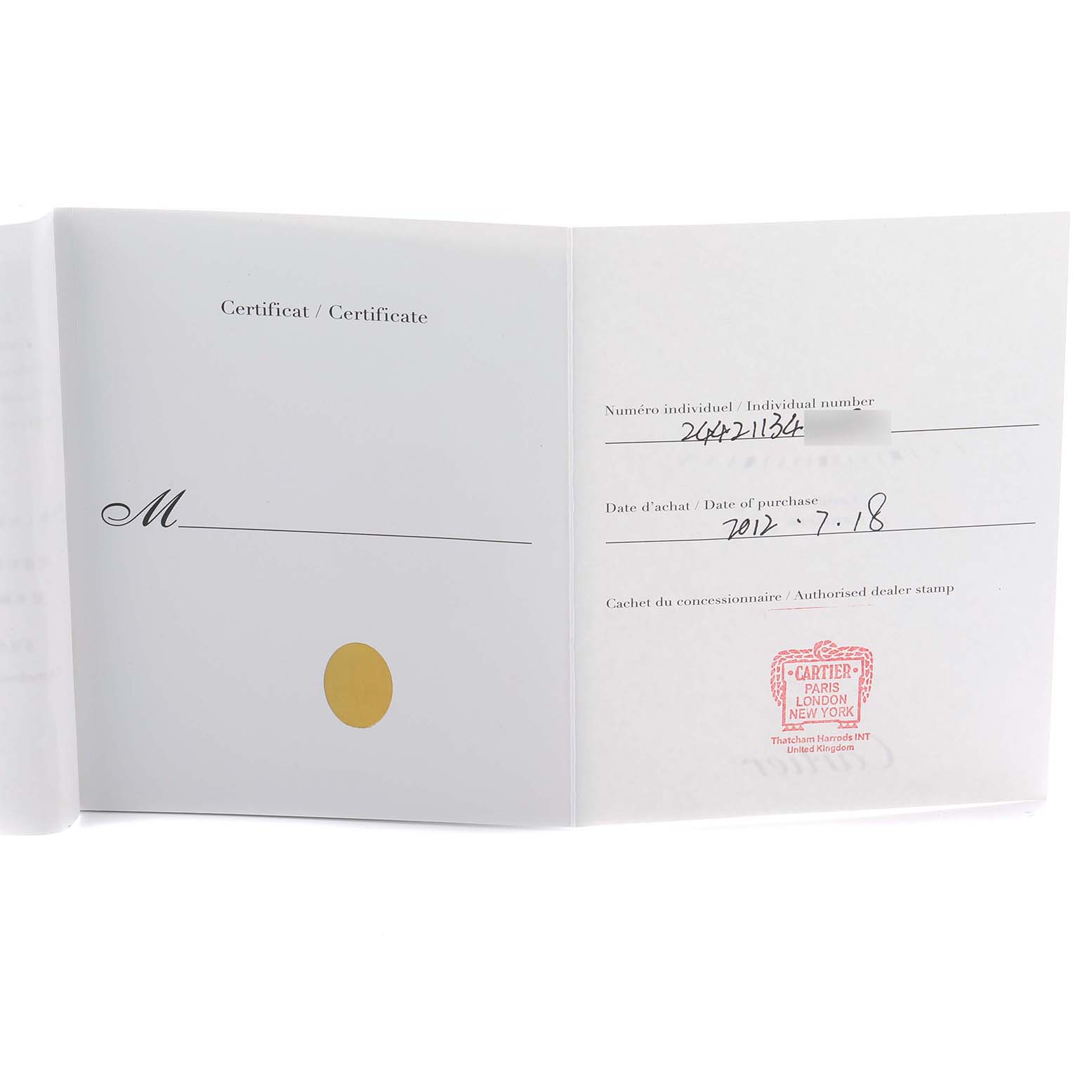 The image shows the warranty certificate for a Cartier Tank Louis W1529856 Women's Yellow Gold Silver Dial watch, displayed open with purchase details.