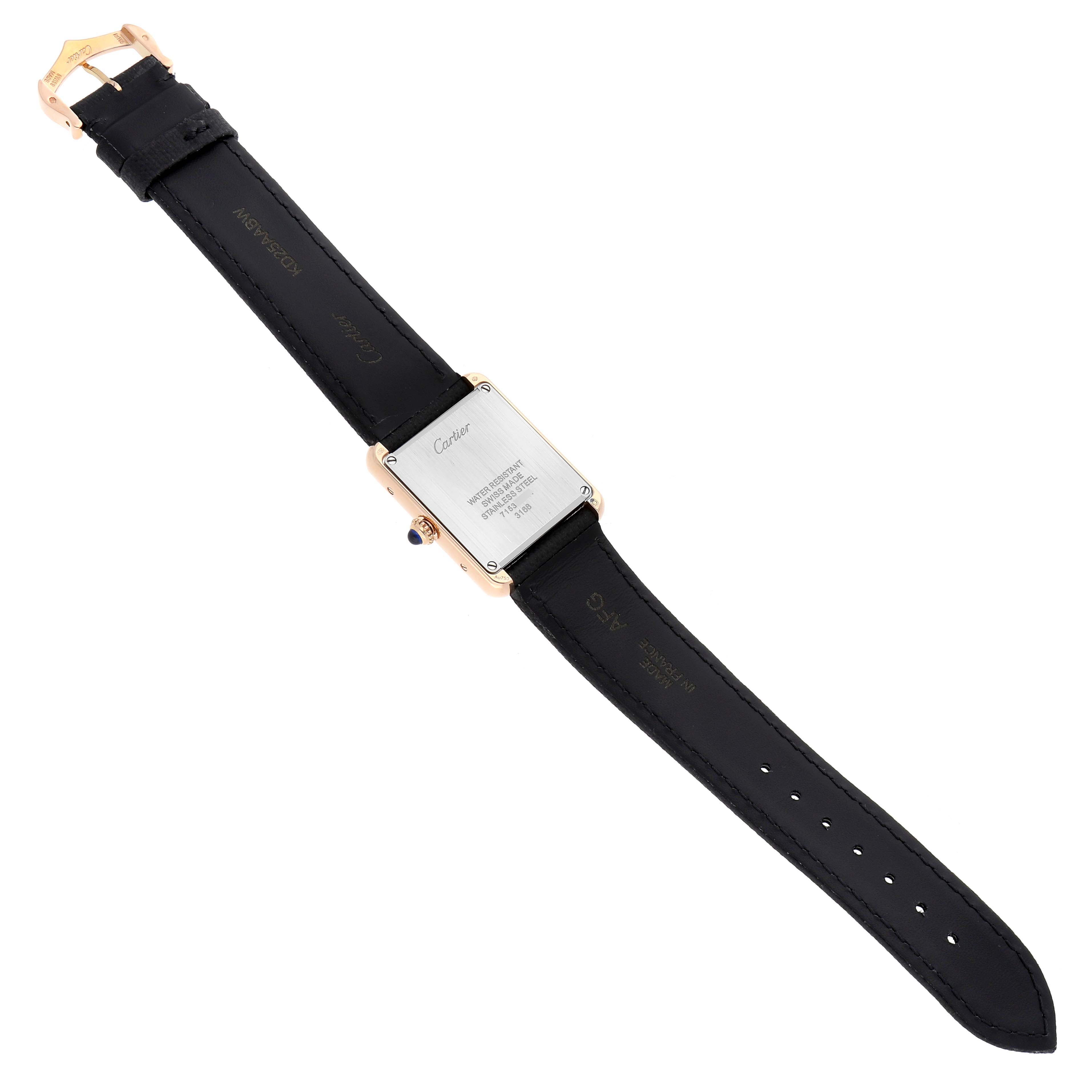 The Cartier Tank Solo W5200024 Women's Rose Gold Silver Dial watch is shown from the back, featuring the case back, strap, and buckle.