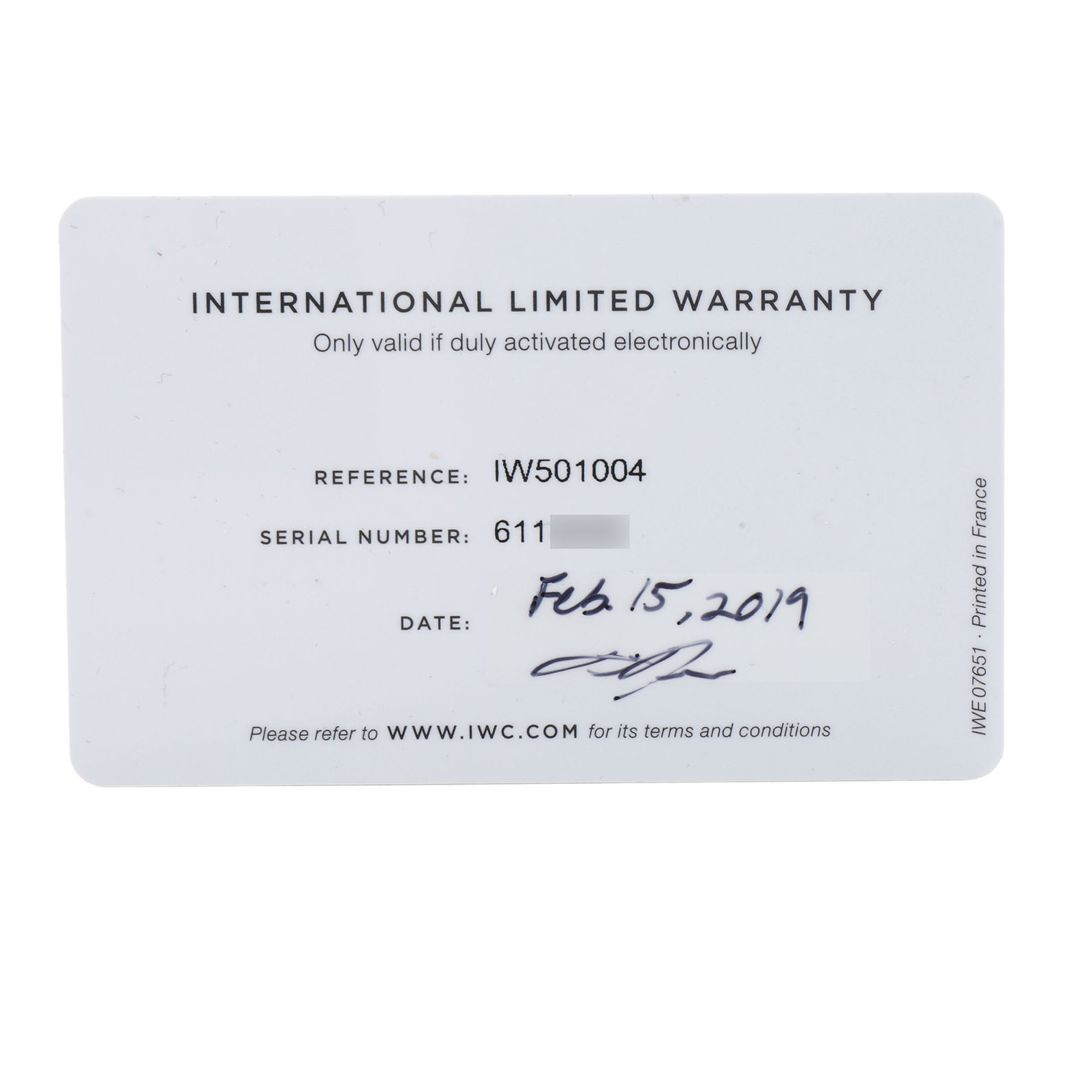 The image shows an IWC Pilot IW510301 Men's Titanium Black Dial model's international limited warranty card with reference and serial numbers.