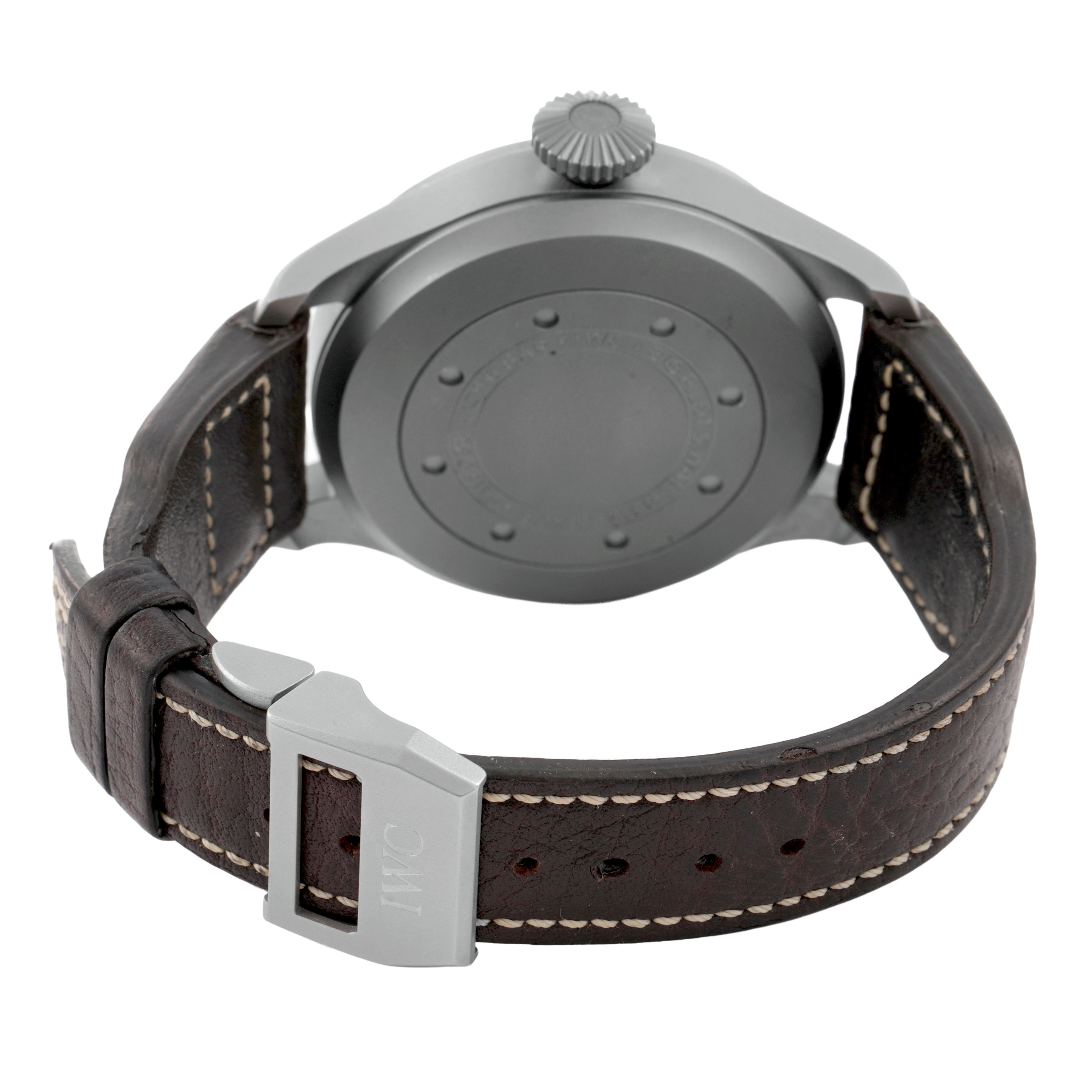 The image shows the back view of an IWC Pilot IW510301 Men's Titanium Black Dial watch, highlighting the case back, crown, and leather strap with the IWC buckle.