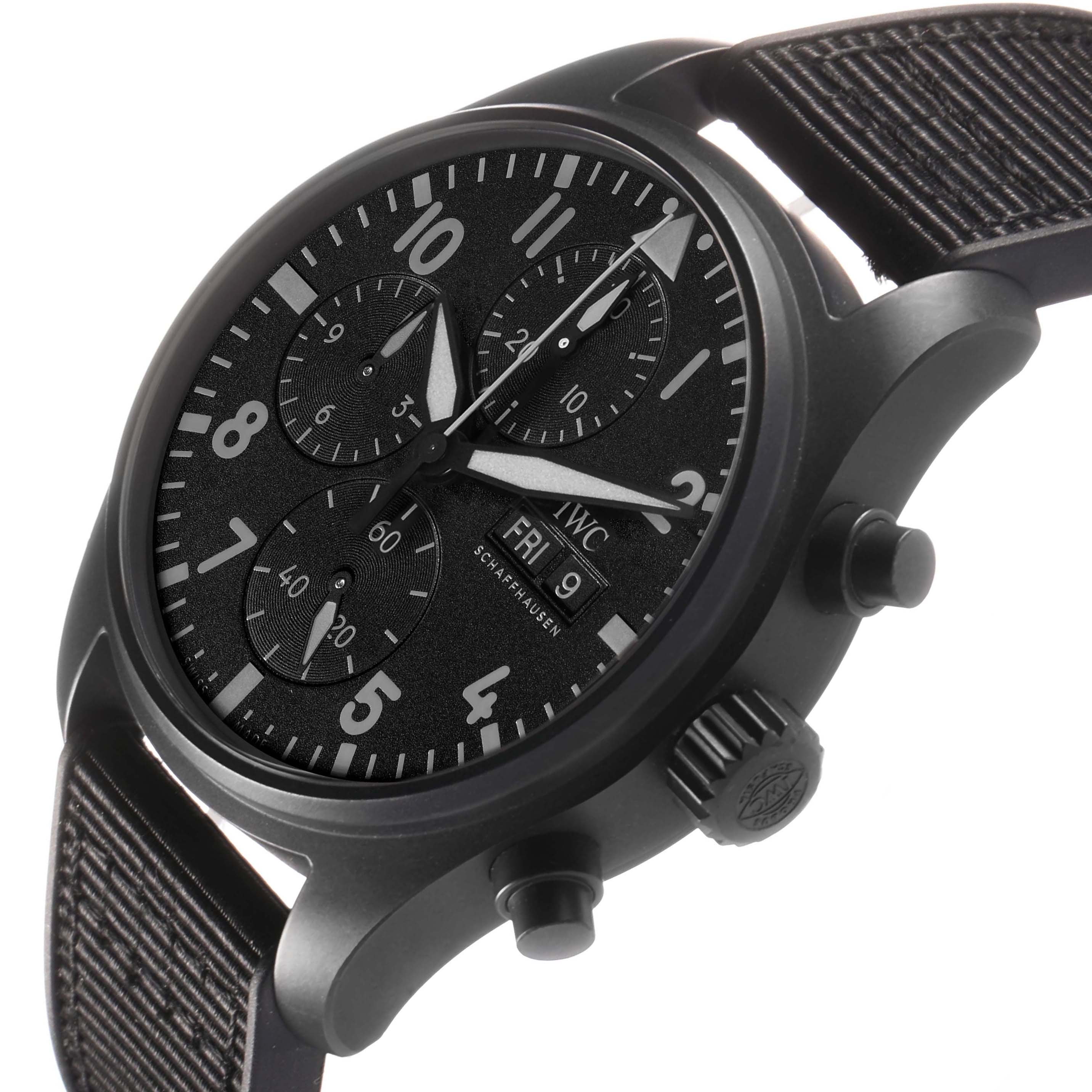 The IWC Pilot IW388106 Men's Ceramic Black Dial watch is shown at a slight angle, displaying the dial, subdials, crown, pushers, and a textured strap.
