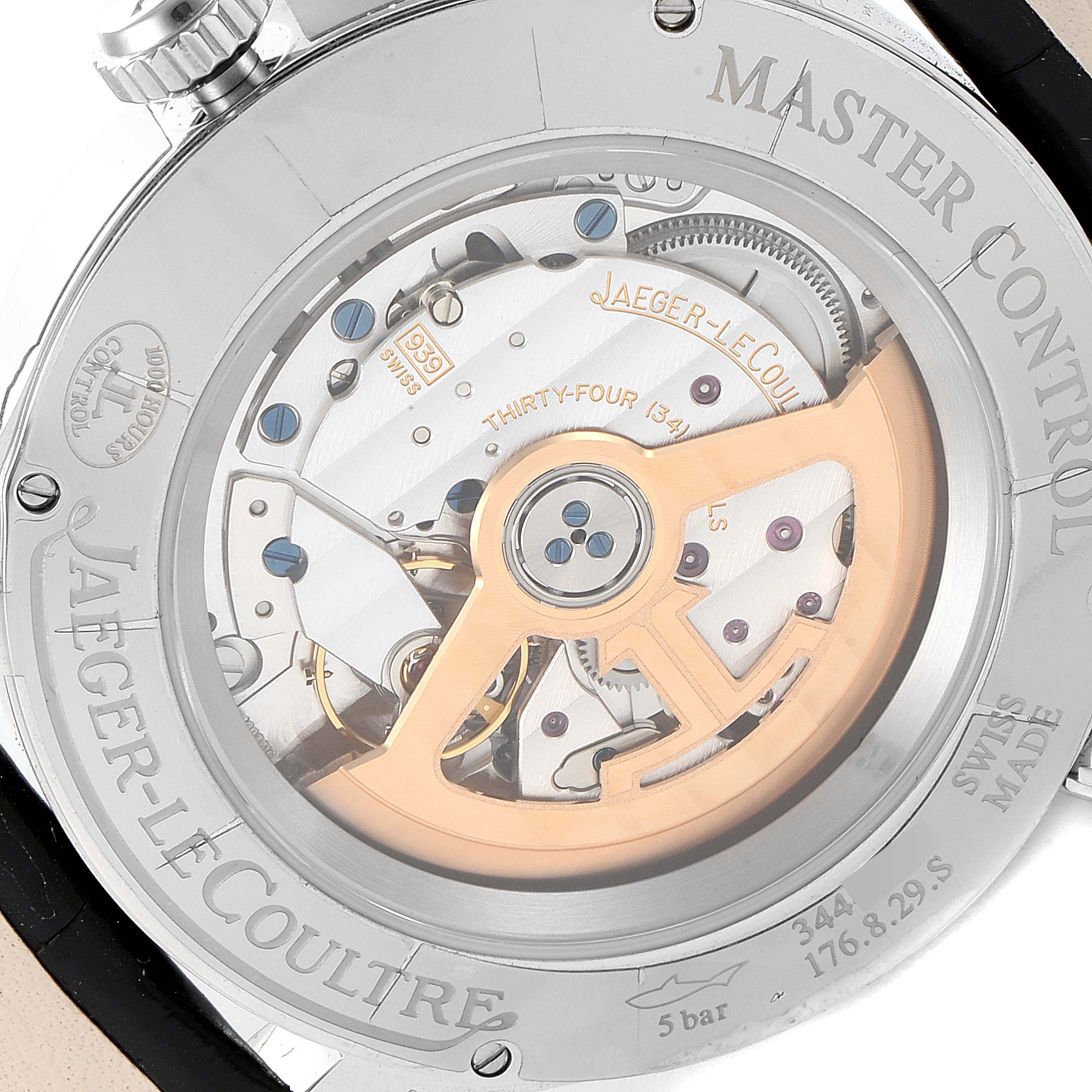 The image shows the back view of the Jaeger LeCoultre Master Q1428421 Men's Stainless Steel Silver Dial Q1428421 Men's Stainless Steel Silver Dial model, highlighting the movement and inner mechanics.