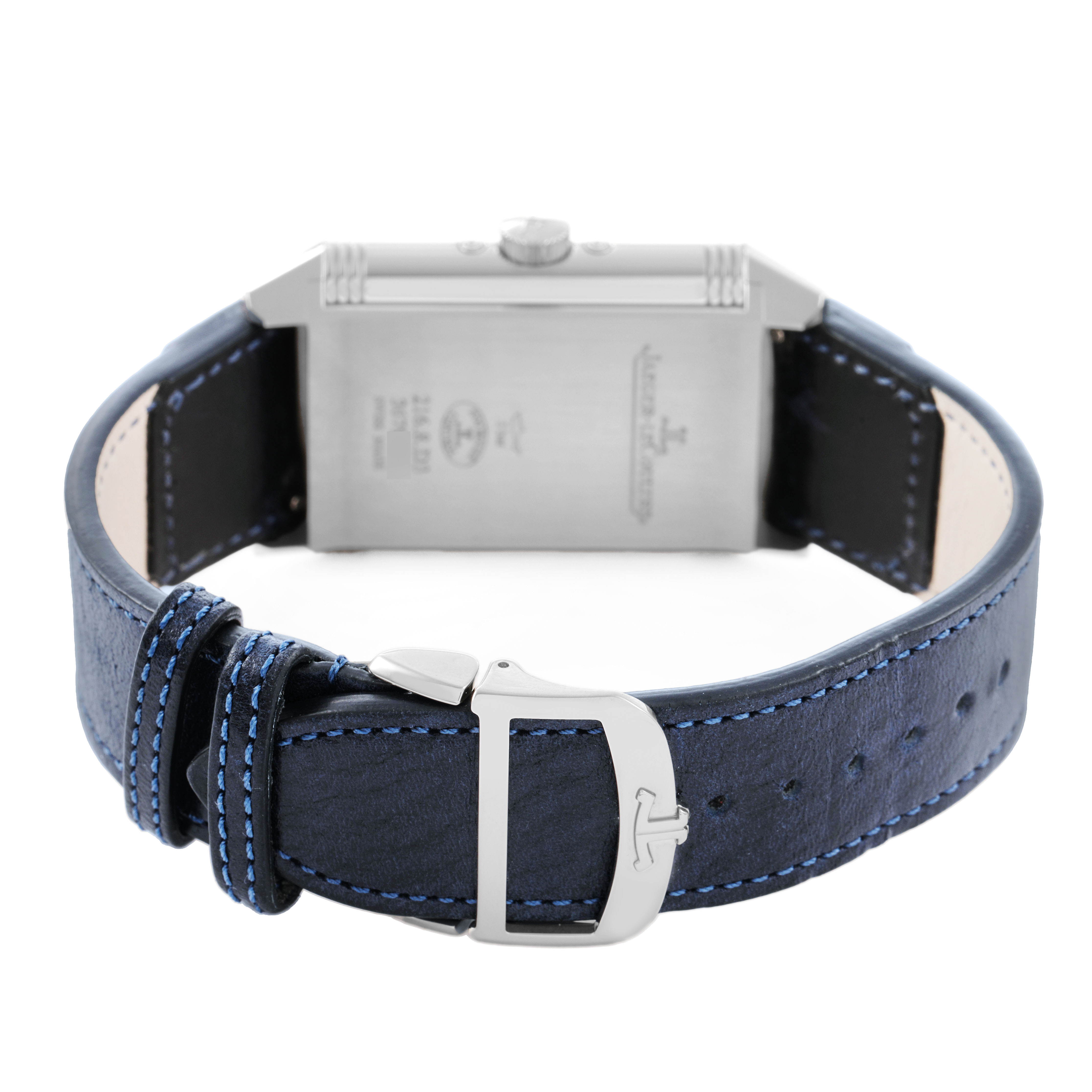 The image shows the back of a Jaeger LeCoultre Reverso Q3918420 / 216.8.D3 Men's Stainless Steel Silver Dial watch, highlighting the clasp and leather strap with blue stitching.