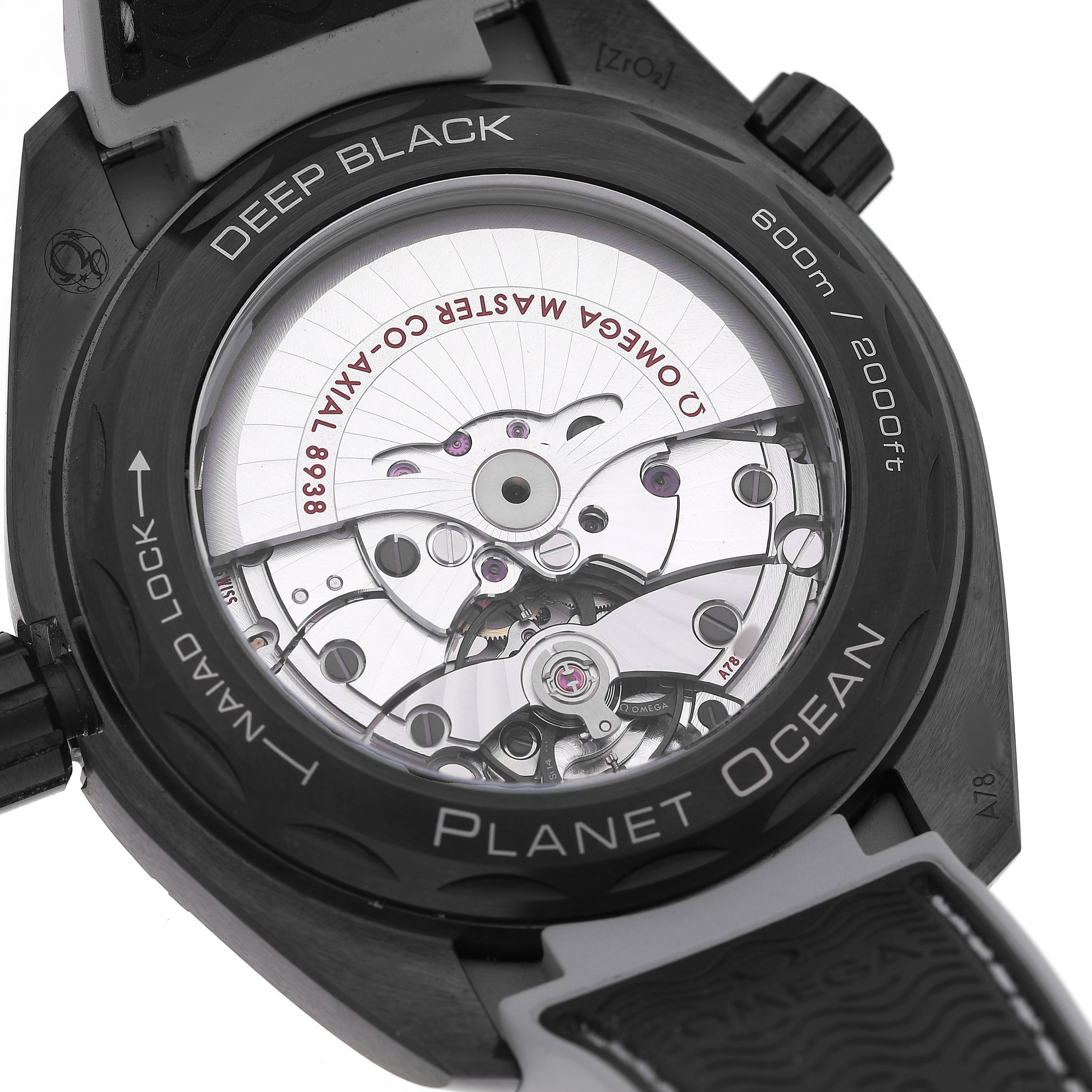 The image shows a rear view of the Omega Planet Ocean 215.92.46.22.01.007 Men's Ceramic Black Dial watch, highlighting the movement and the "Deep Black" case back.