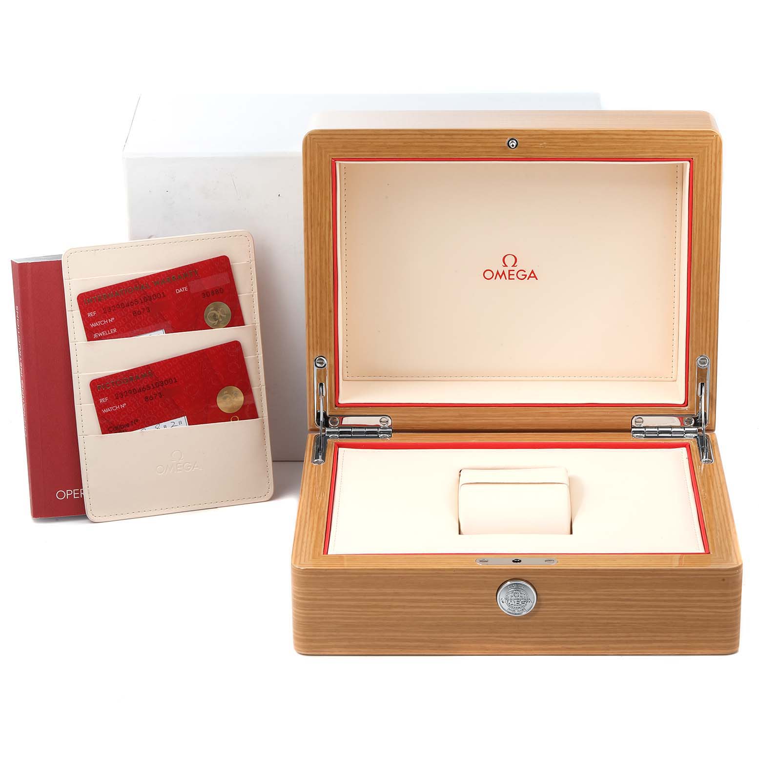 The image shows the open wooden box for an Omega Planet Ocean 232.90.46.51.03.001 Men's Titanium Blue Dial 232.90.46.51.03.001 Men's Titanium Blue Dial watch, along with warranty cards and documentation holder.