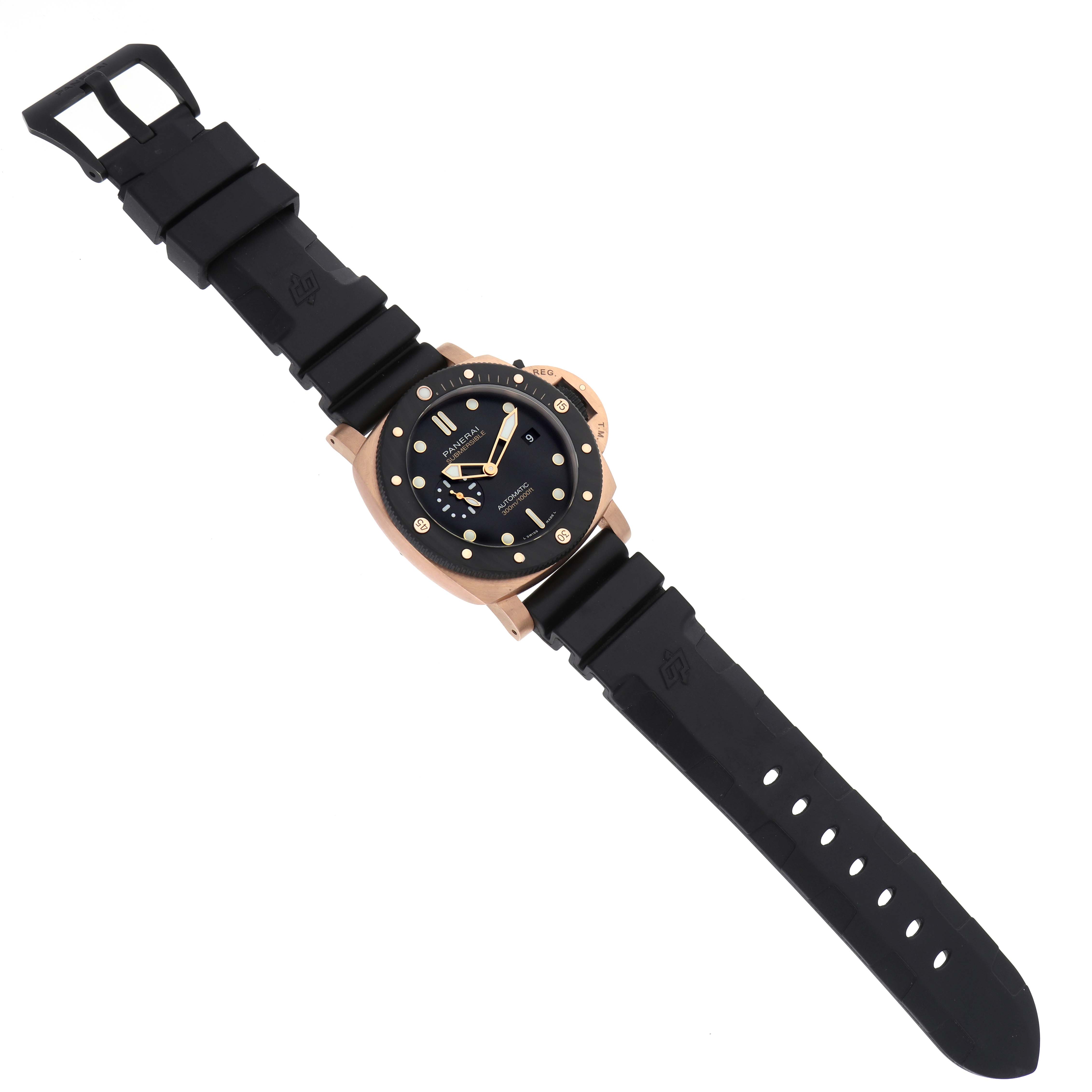 The Panerai Submersible PAM01070 Men's Rose Gold Black Dial PAM01070 Men's Rose Gold Black Dial watch is shown from a top-down view, displaying its face, bezel, and black strap.
