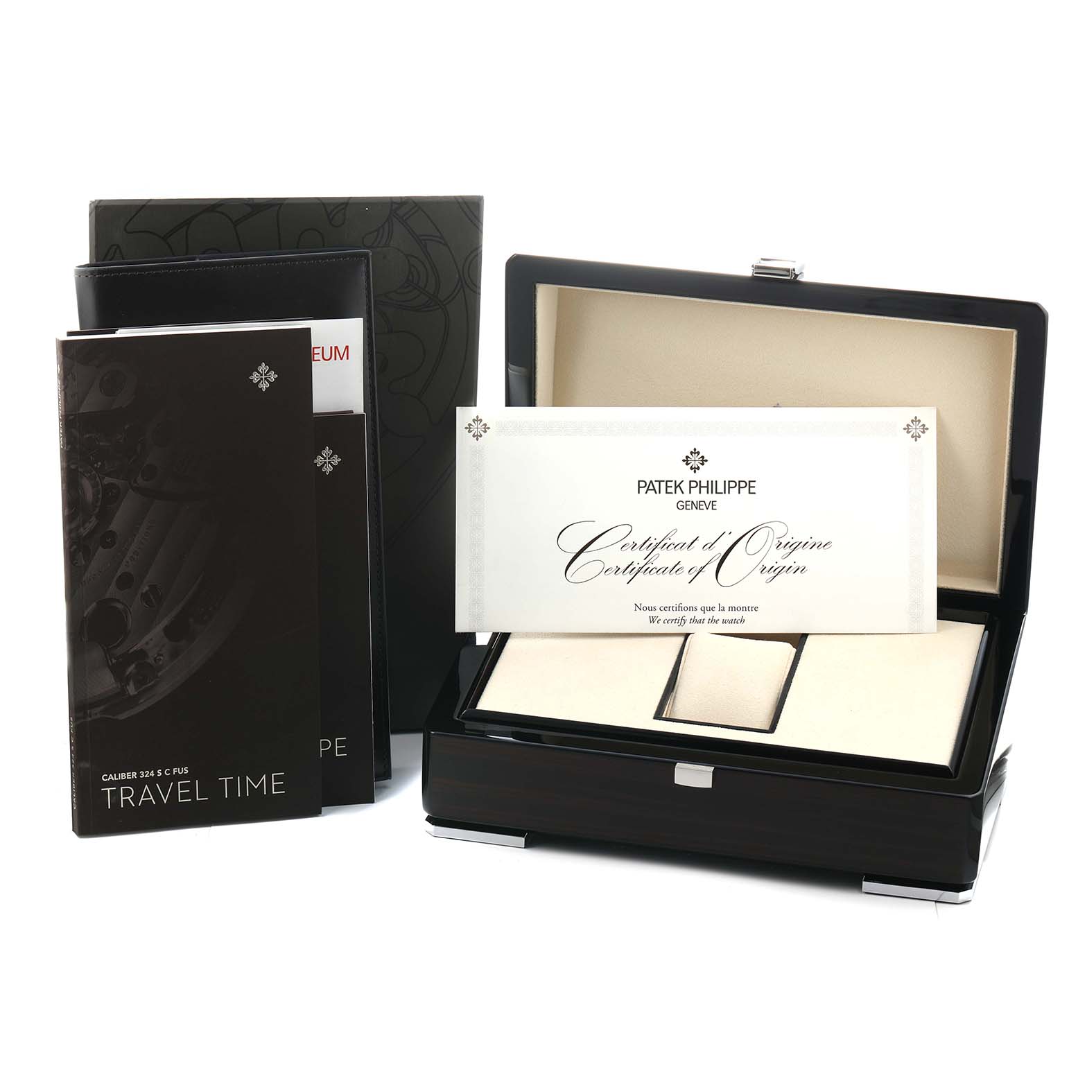 The image shows packaging and documents for a Calatrava model by Patek Philippe, featuring a box and certificates.