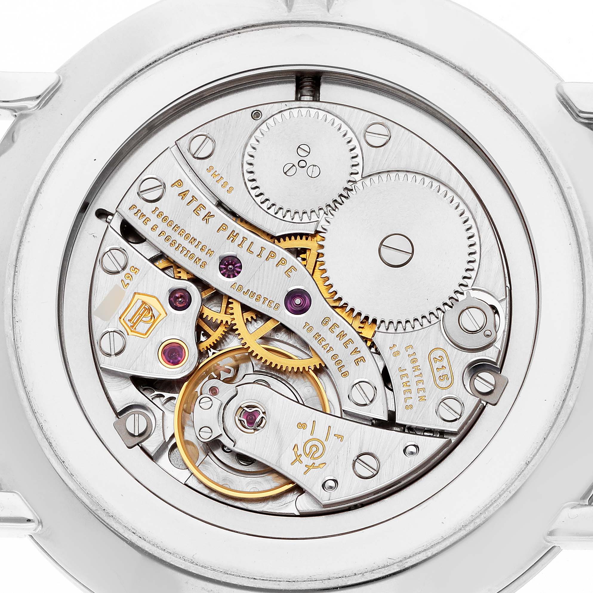 This image shows the back view of the Patek Philippe Calatrava 5119G-001 Men
s White Gold White Dial watch, highlighting its intricate mechanical movement.