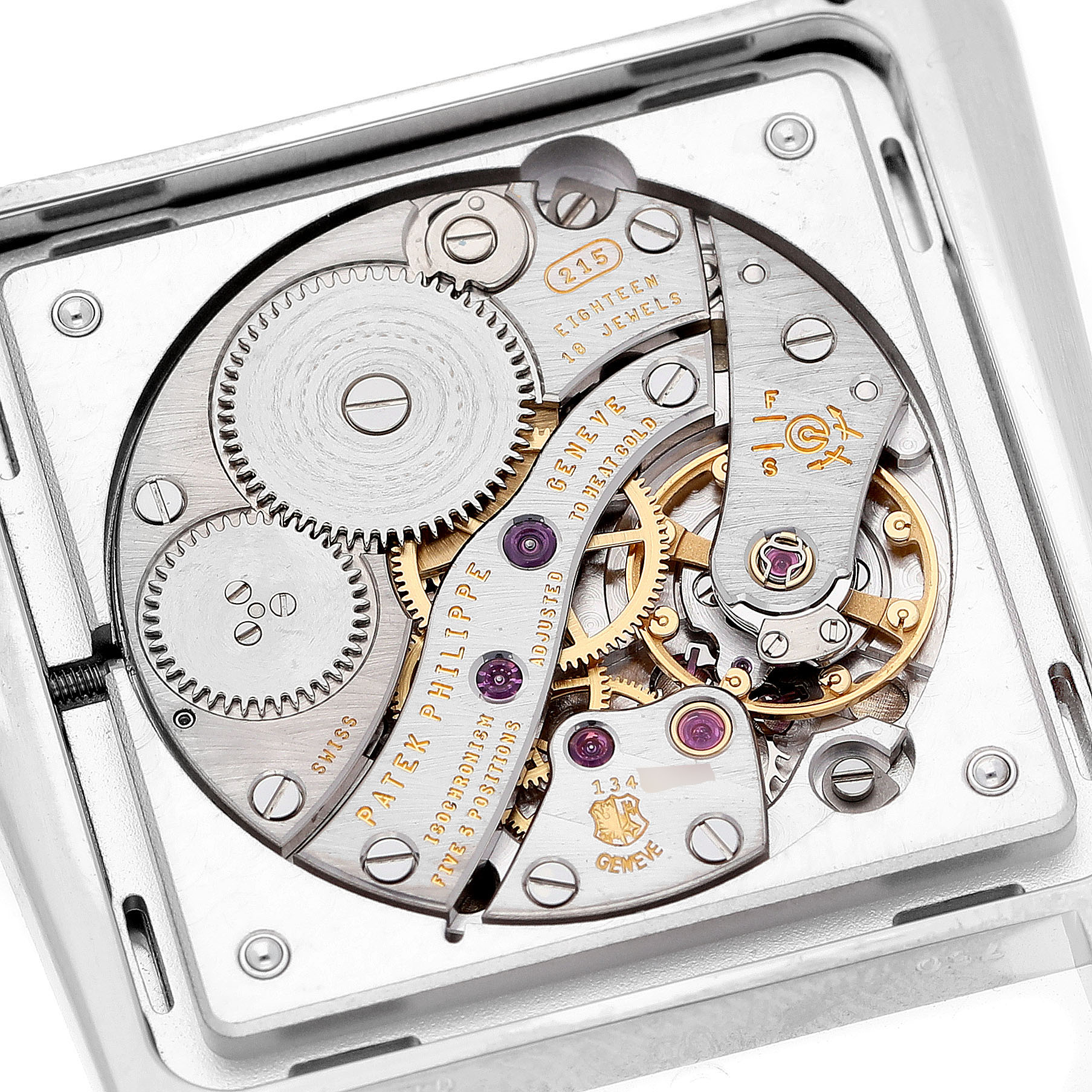 The image shows the movement of a Patek Philippe Calatrava 4888G-001 Women's White Gold Silver Dial watch from a top-down angle, revealing gears and components.