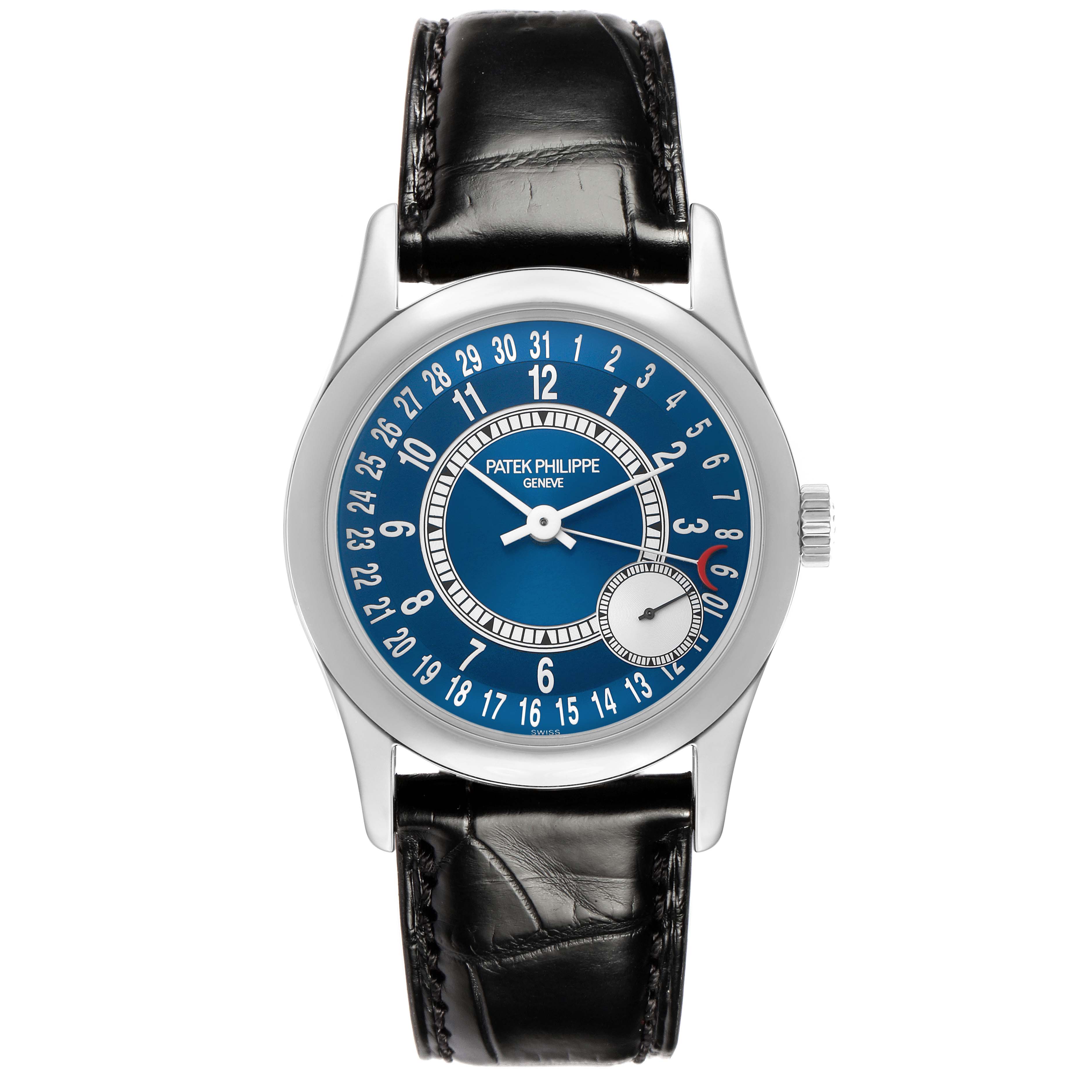 The Patek Philippe Calatrava 6000G Men
s White Gold Blue Dial watch is shown from a front angle, highlighting its blue dial, date markers, and leather strap.
