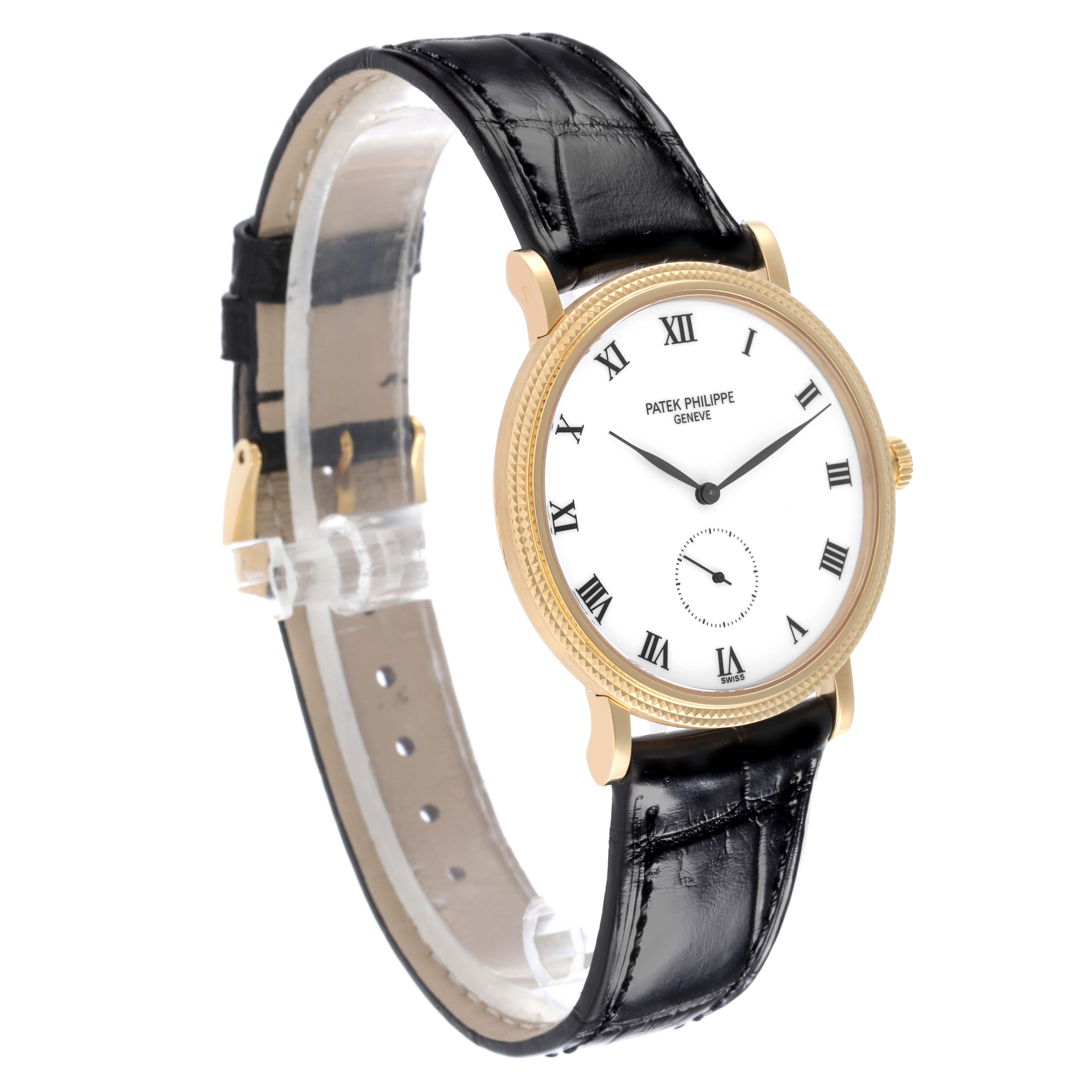The Patek Philippe Calatrava 3919J Men's Yellow Gold White Dial 3919J Men's Yellow Gold White Dial watch is shown at a three-quarter angle, highlighting the face, black strap, and gold case.