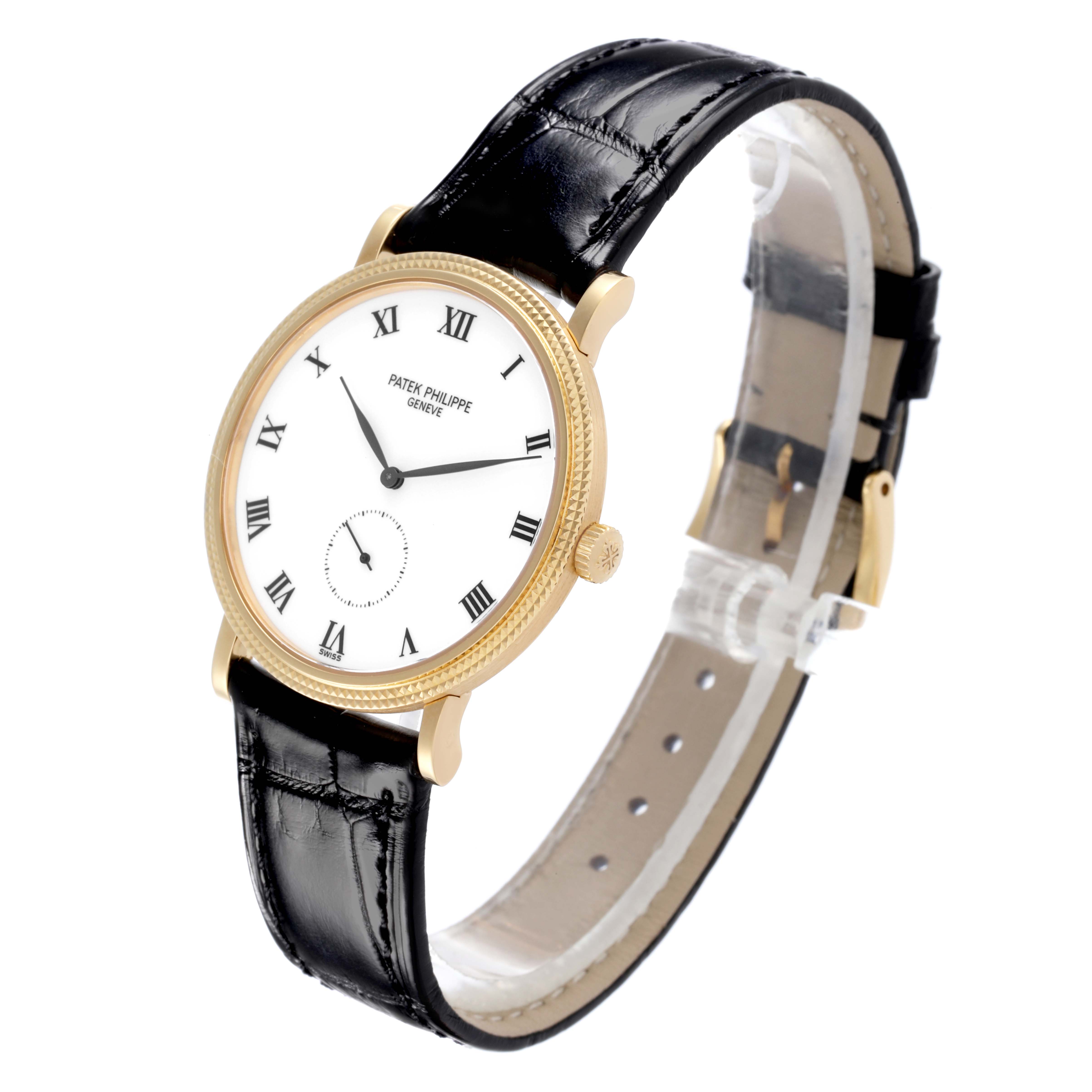 The Patek Philippe Calatrava 3919J Men's Yellow Gold White Dial 3919J Men's Yellow Gold White Dial watch is shown at a three-quarter angle, displaying its white dial, gold case, and black leather strap.