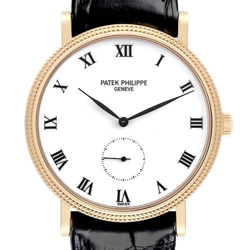 The Patek Philippe Calatrava watch is shown from a frontal angle, highlighting its face, bezel, and black leather strap.