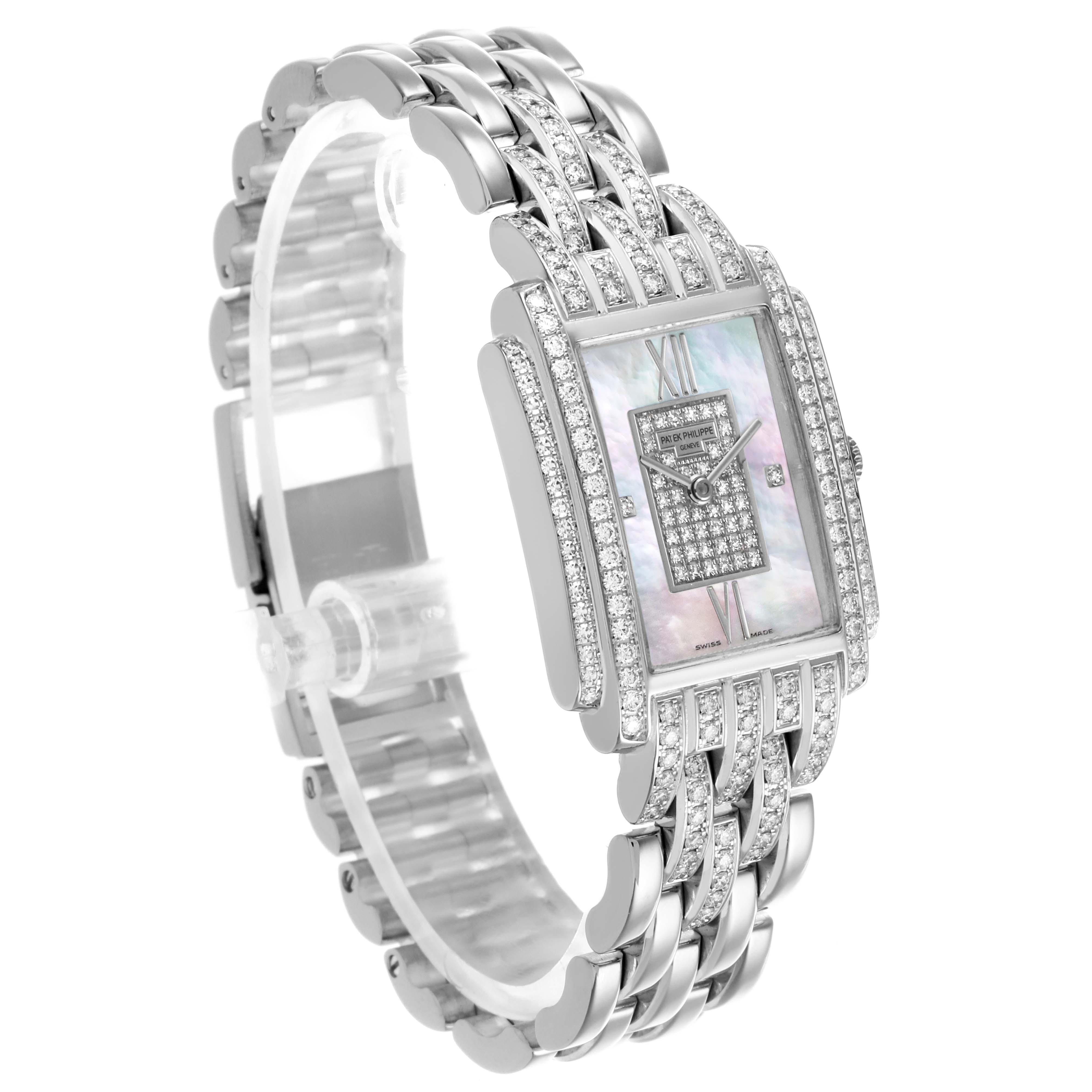 The Patek Philippe Gondolo 4825G/120G-001 Women's White Gold Mother of Pearl Dial 4825G/120G-001 Women's White Gold Mother of Pearl Dial watch is shown at an angled view, highlighting its face, bezel, and bracelet detailing.