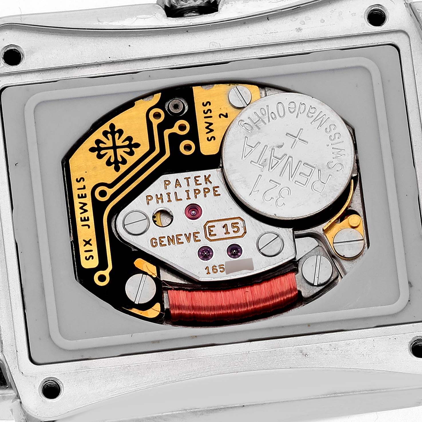 The image shows the back of a Patek Philippe Gondolo 4825G/120G-001 Women's White Gold Mother of Pearl Dial 4825G/120G-001 Women's White Gold Mother of Pearl Dial watch, highlighting the movement components and battery.