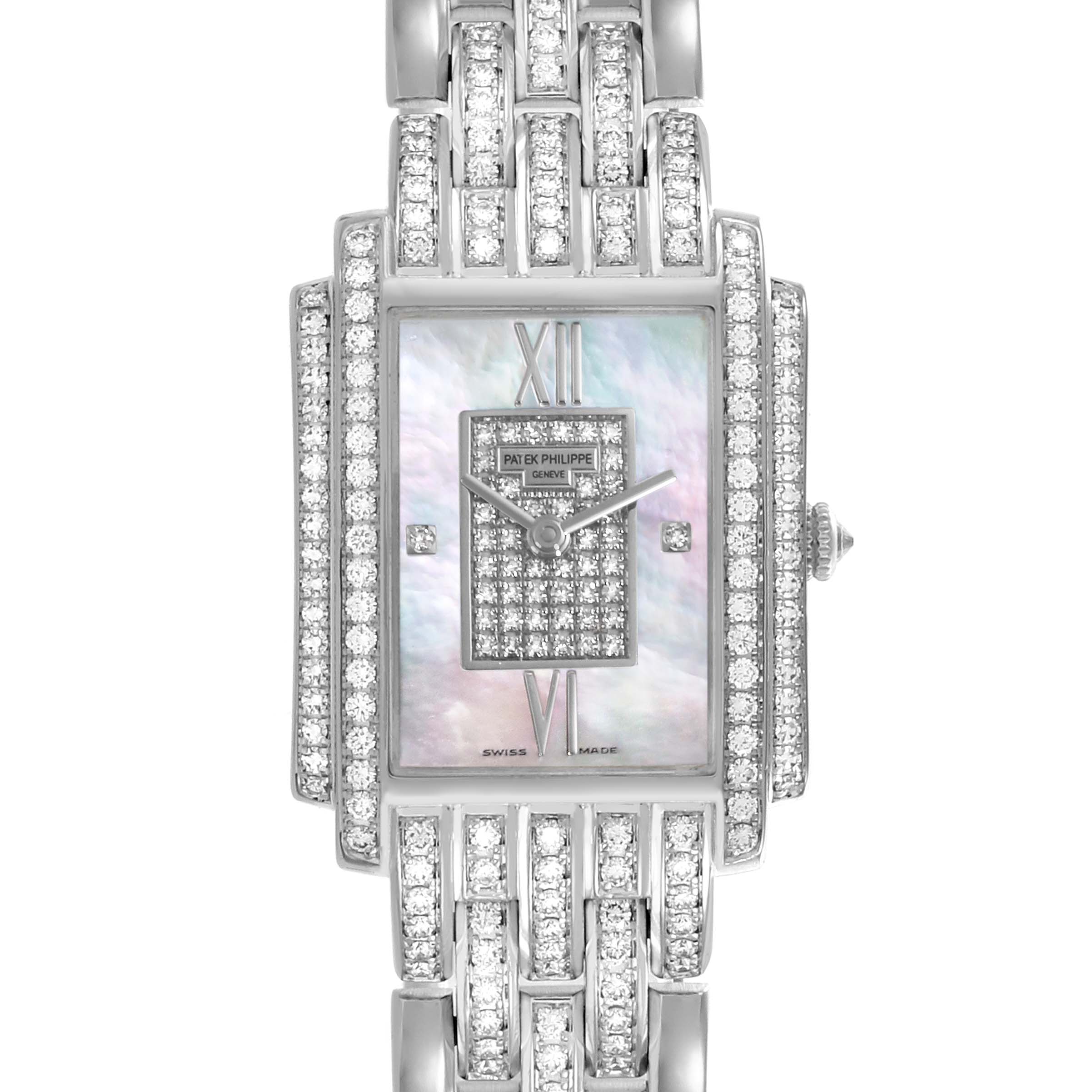 The Patek Philippe Gondolo 4825G/120G-001 Women's White Gold Mother of Pearl Dial 4825G/120G-001 Women's White Gold Mother of Pearl Dial watch is shown from the front, highlighting its rectangular face and diamond details on the band.