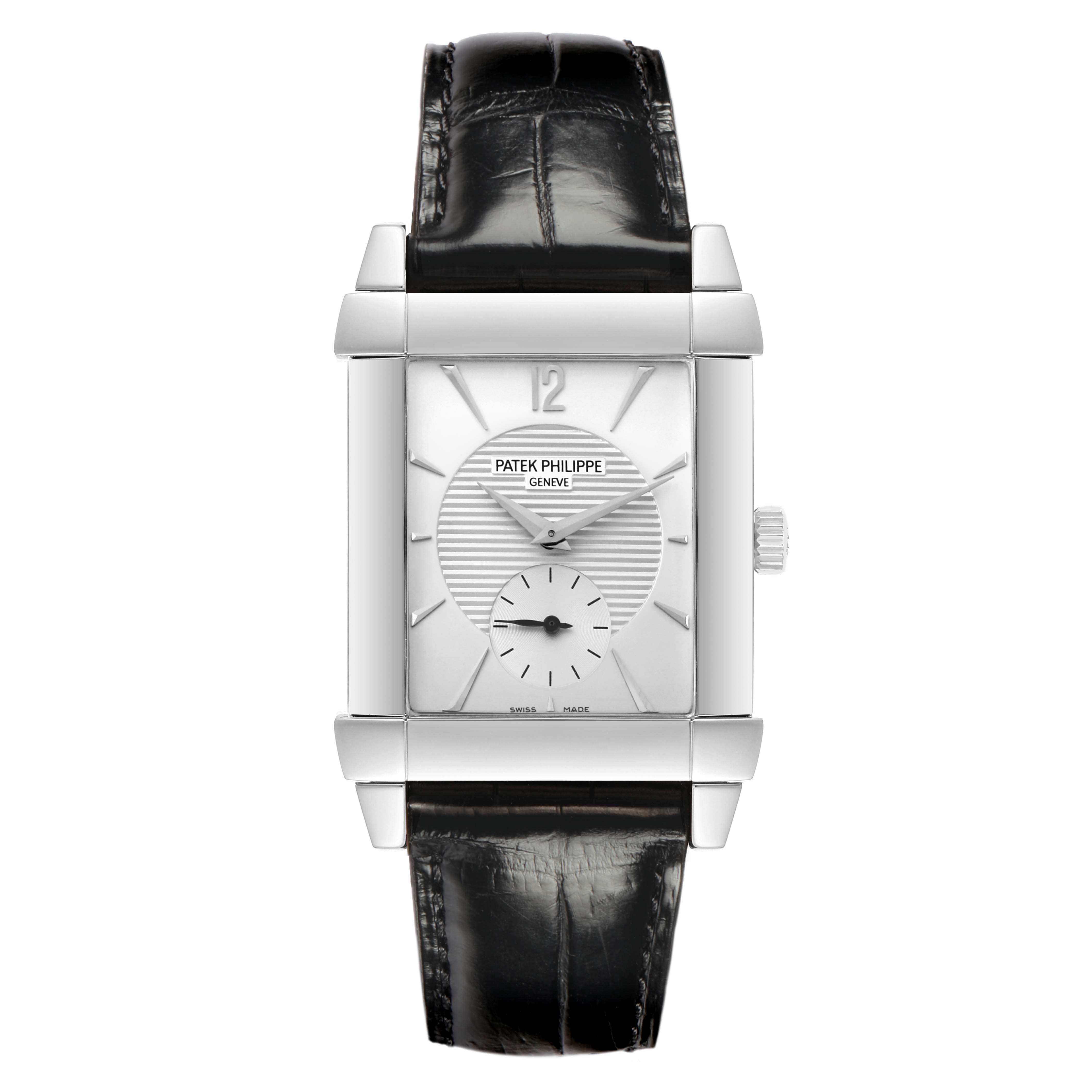 The image shows a frontal view of a Patek Philippe Gondolo 5111G-001 Men
s White Gold Silver Dial watch, highlighting its rectangular dial, silver indices, and black leather strap.