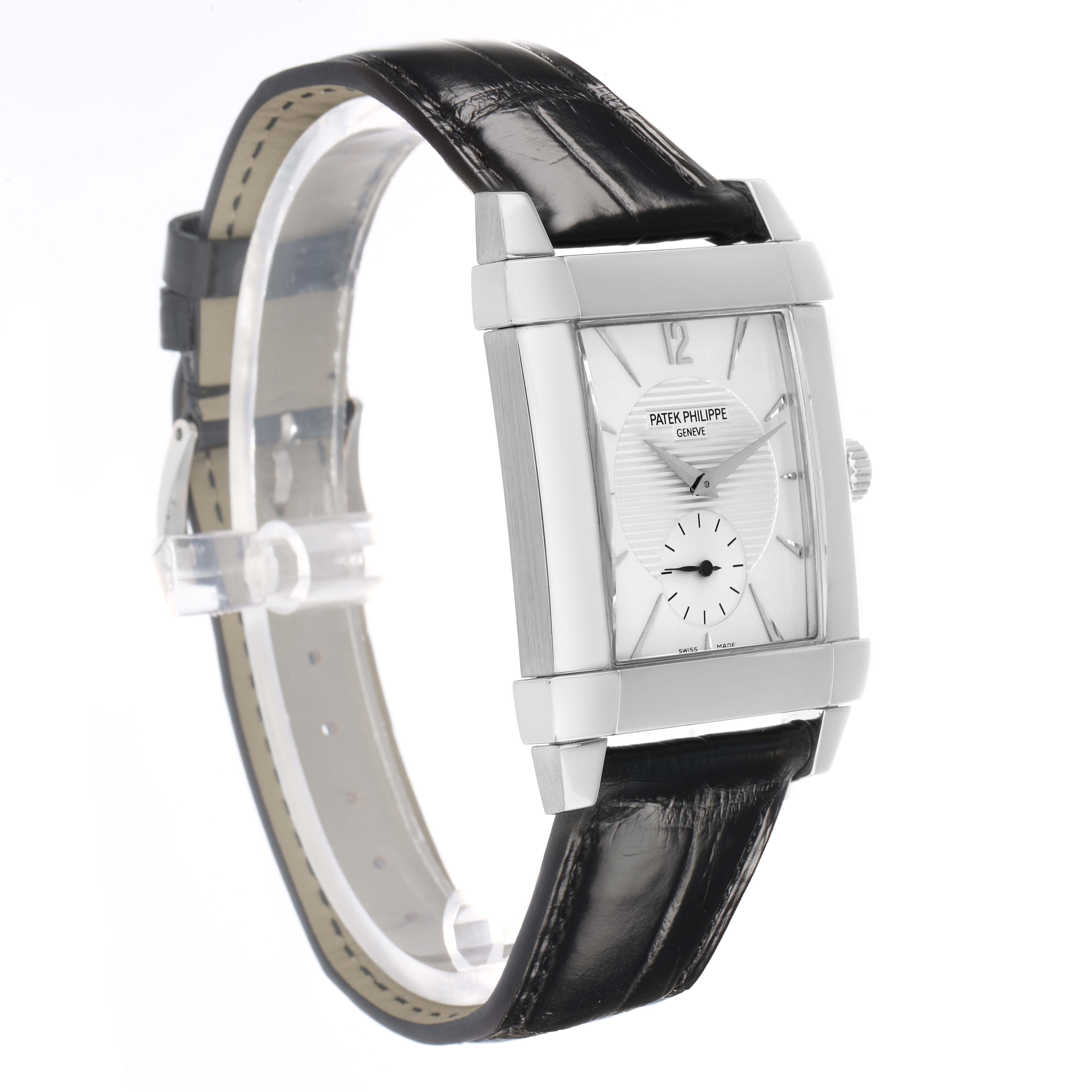 The Patek Philippe Gondolo 5111G-001 Men
s White Gold Silver Dial watch is shown at a three-quarter angle, highlighting its rectangular case and leather strap.