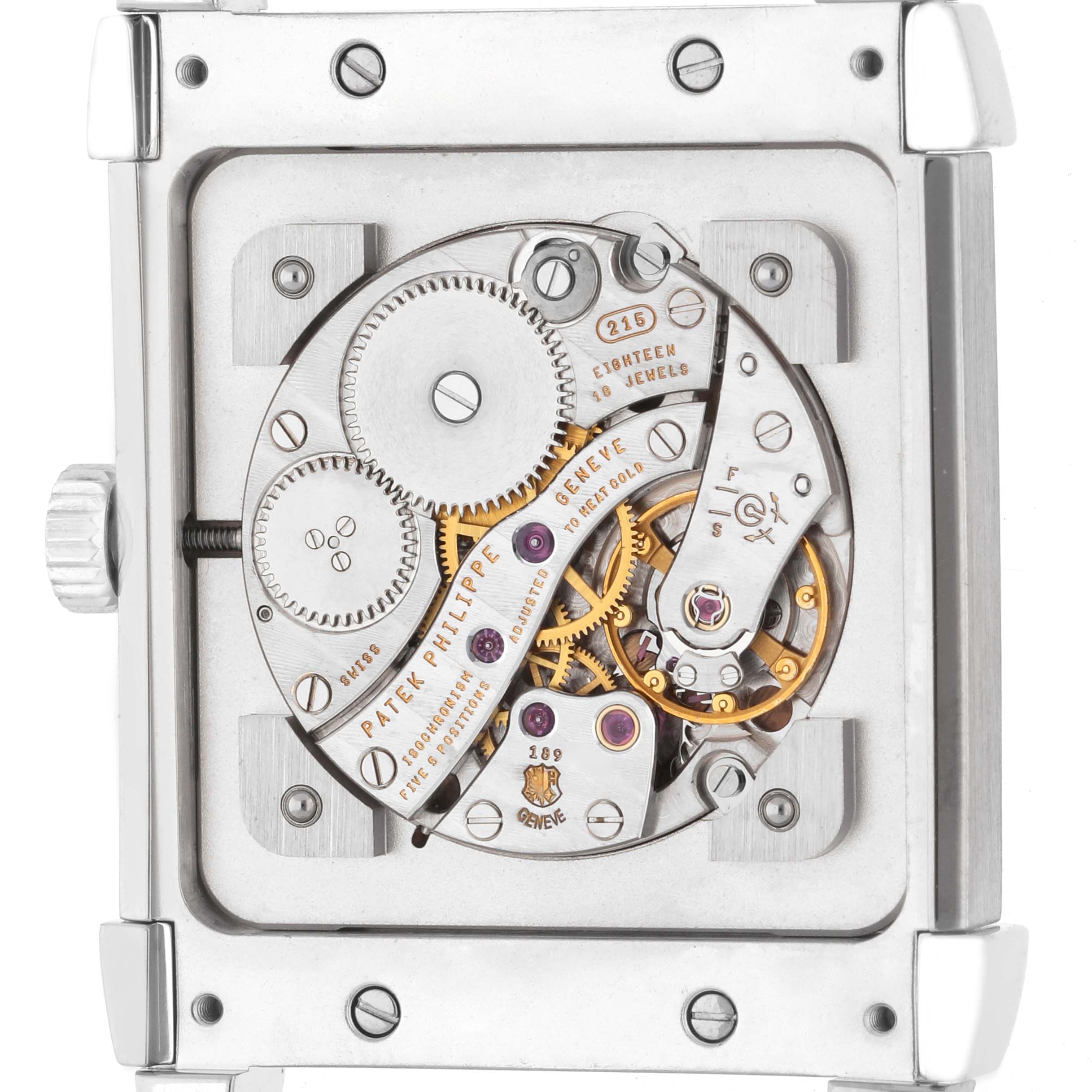 The image shows the case back of the Patek Philippe Gondolo 5111G-001 Men
s White Gold Silver Dial watch, revealing its intricate mechanical movement.