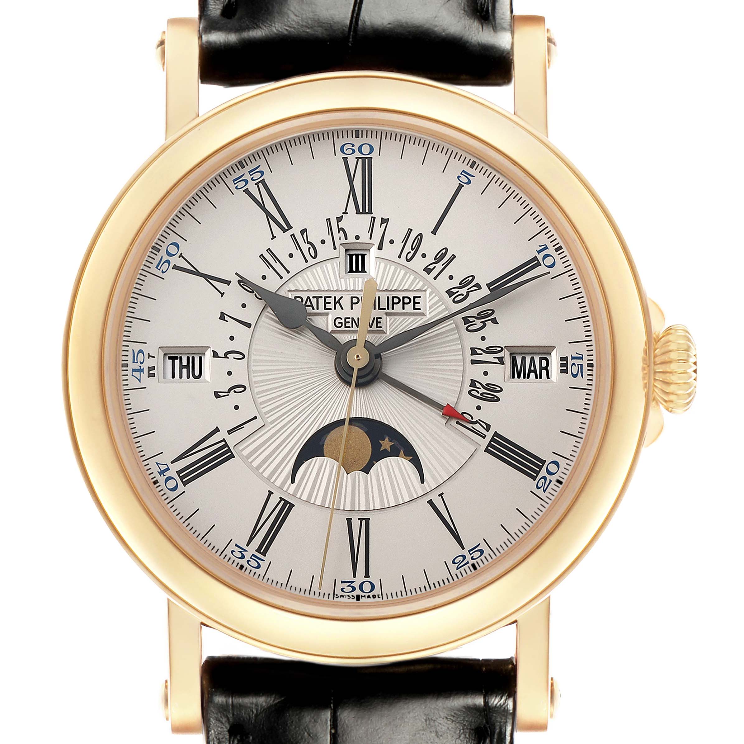 The Patek Philippe Complications 5159J-001 Men
s Yellow Gold Silver Dial watch is shown from a front angle, displaying the dial with Roman numerals, moon phase, and date indicators.
