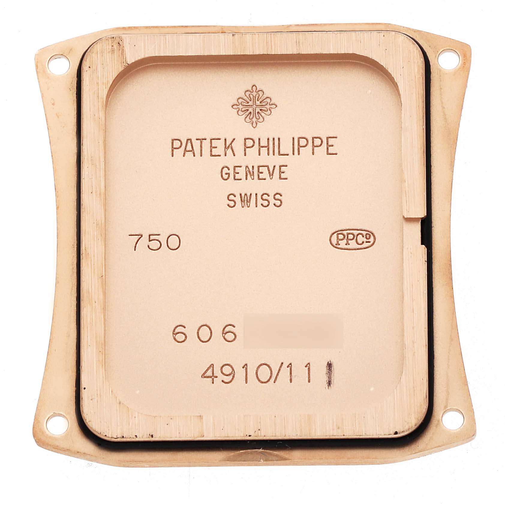 The image shows the back plate of a Patek Philippe Twenty-4 4910/11R-011 Women
s Rose Gold Silver Dial watch, displaying engravings and manufacturer details.