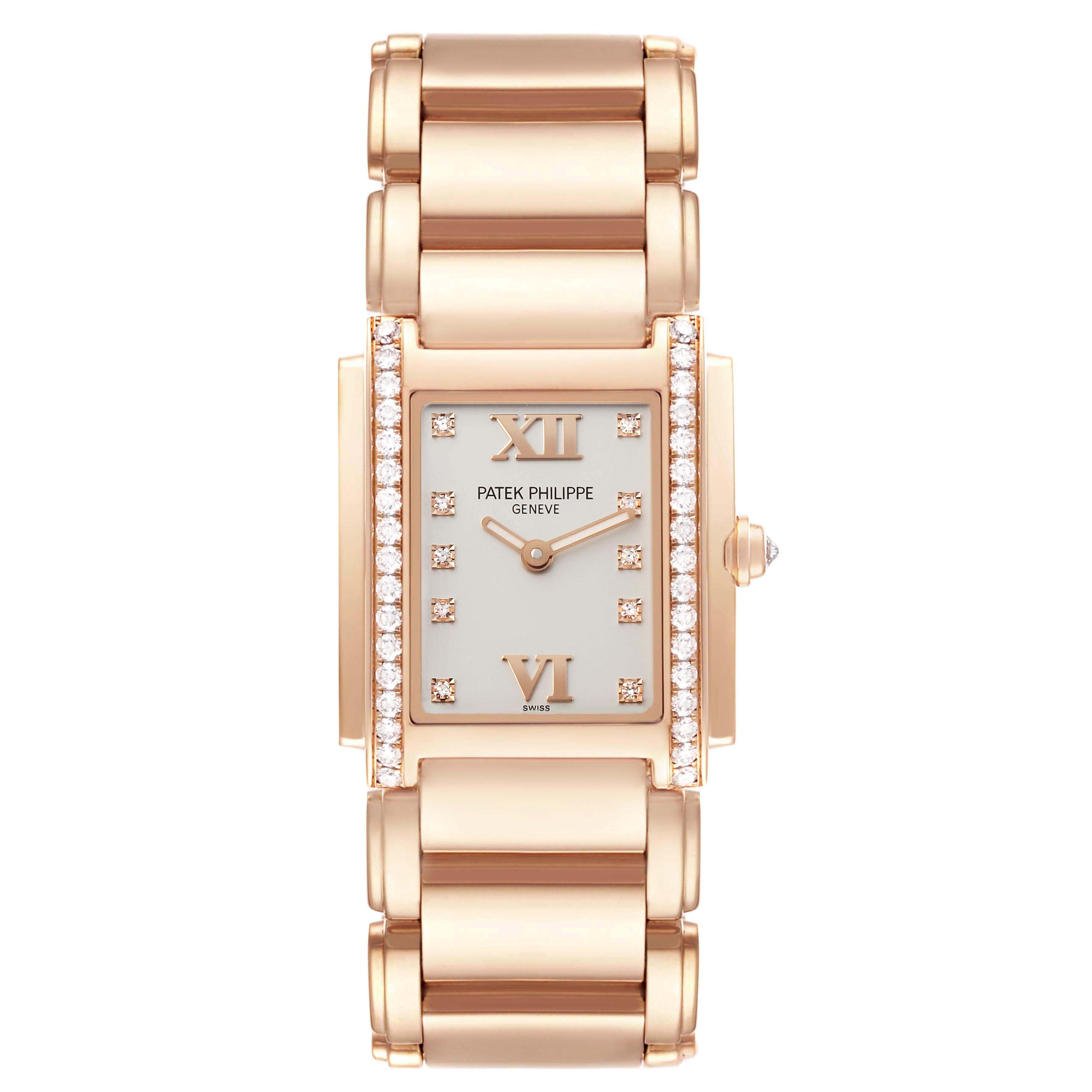 The Patek Philippe Twenty-4 4910/11R-011 Women
s Rose Gold Silver Dial watch is shown from a top-down angle, highlighting the face, bezel, and bracelet.