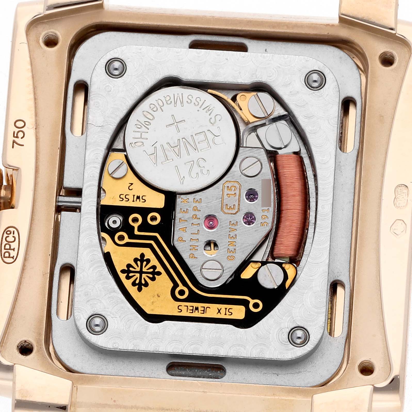 This image shows the back view of a Patek Philippe Twenty-4 4910/11R-011 Women
s Rose Gold Silver Dial watch, highlighting its movement and battery.