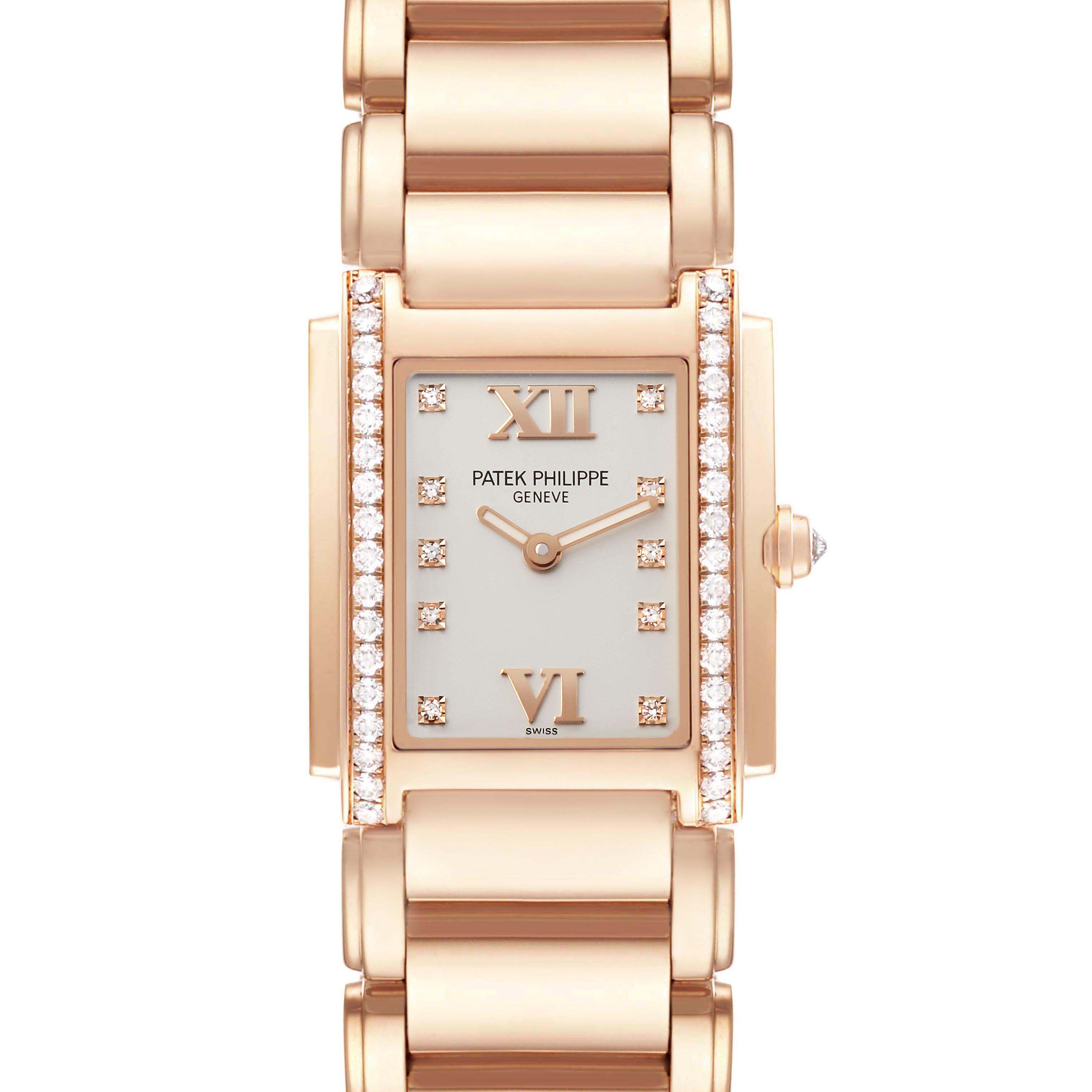The Patek Philippe Twenty-4 4910/11R-011 Women
s Rose Gold Silver Dial watch is shown from a front view, highlighting its rectangular dial, diamond accents, and bracelet.