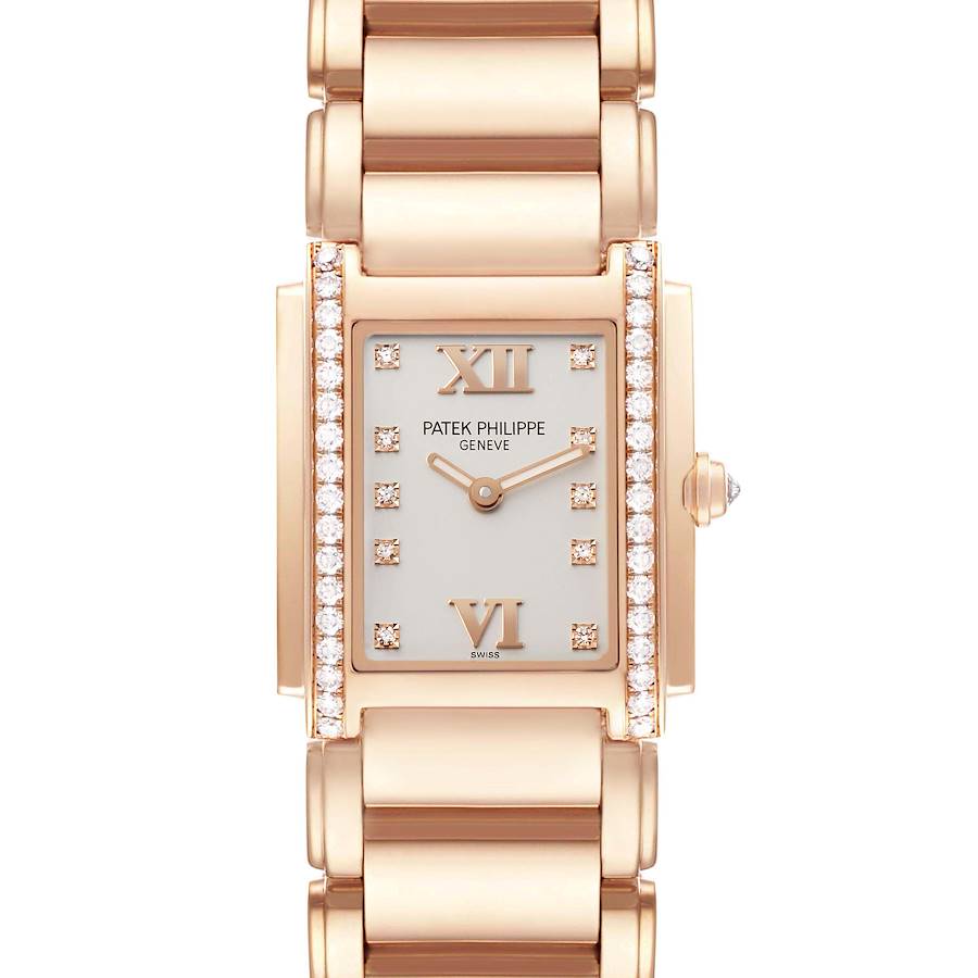 The Patek Philippe Twenty-4 4910/11R-011 Women's Rose Gold Silver Dial watch is shown from a front view, highlighting its rectangular dial, diamond accents, and bracelet.