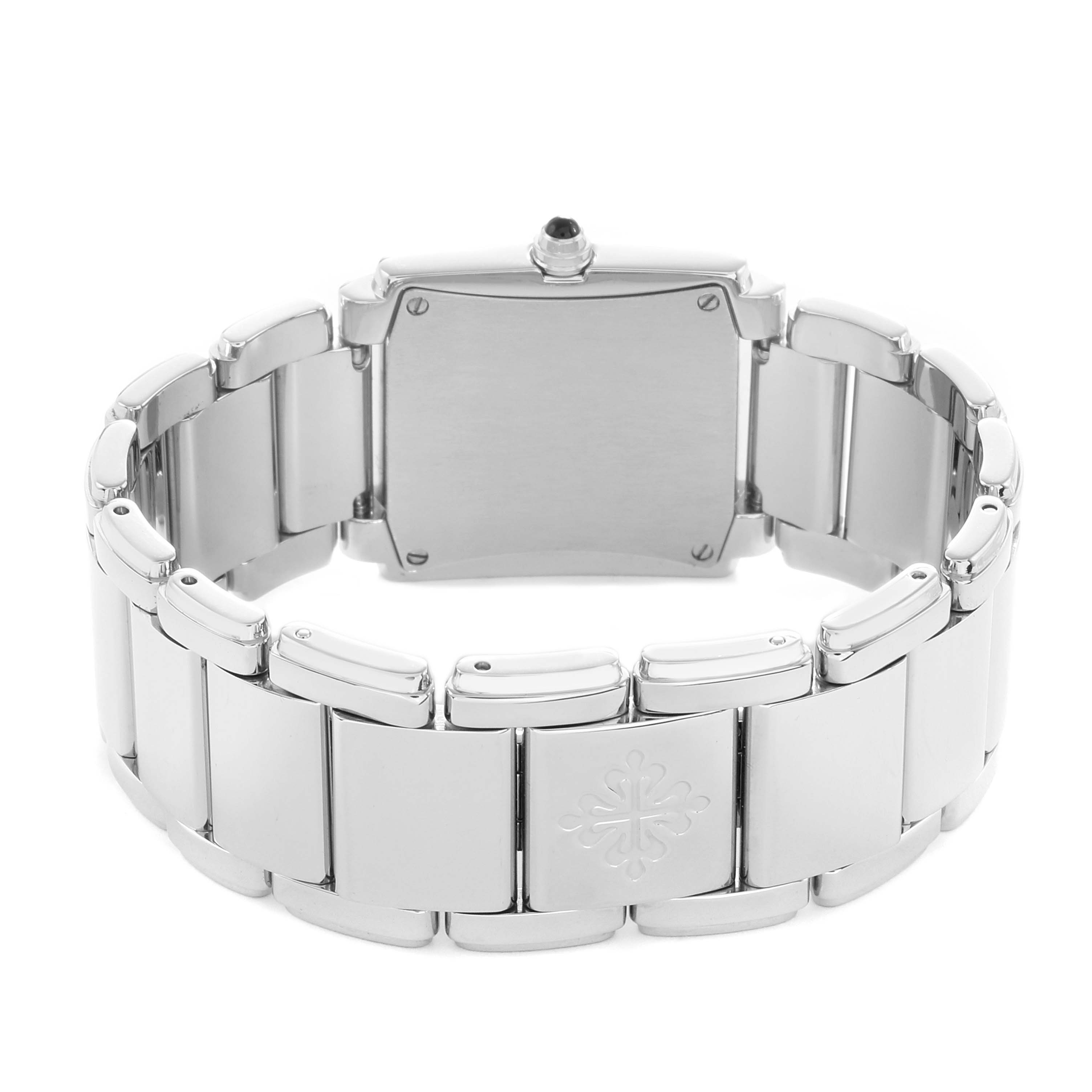 The image shows the back of a Patek Philippe Twenty-4 4910A Women's Stainless Steel Black Dial watch, highlighting the bracelet and case back.