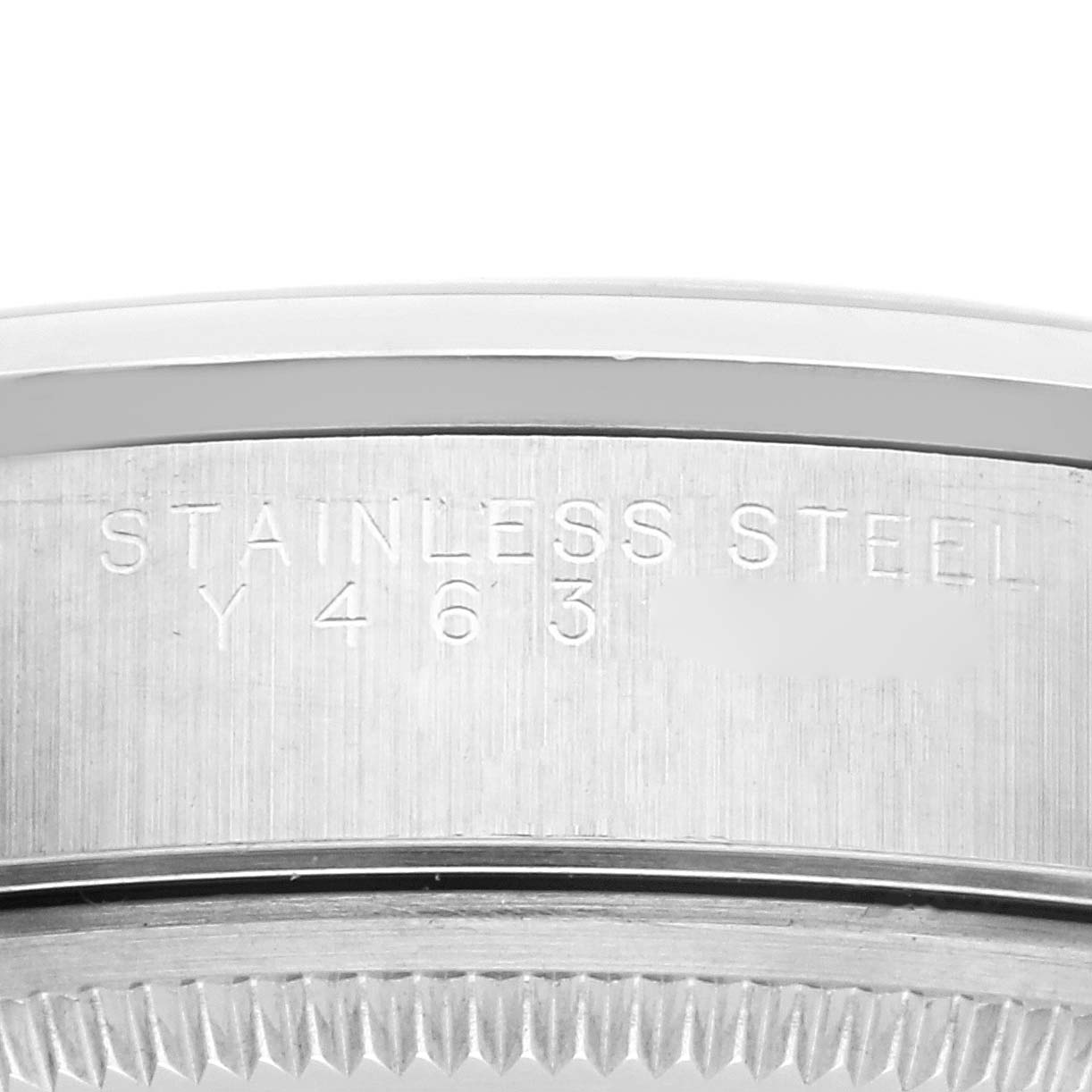 This close-up image shows the engraved side of the Rolex Air-King 14000M Men's Stainless Steel Black Dial 14000M Men's Stainless Steel Black Dial watch case in stainless steel.