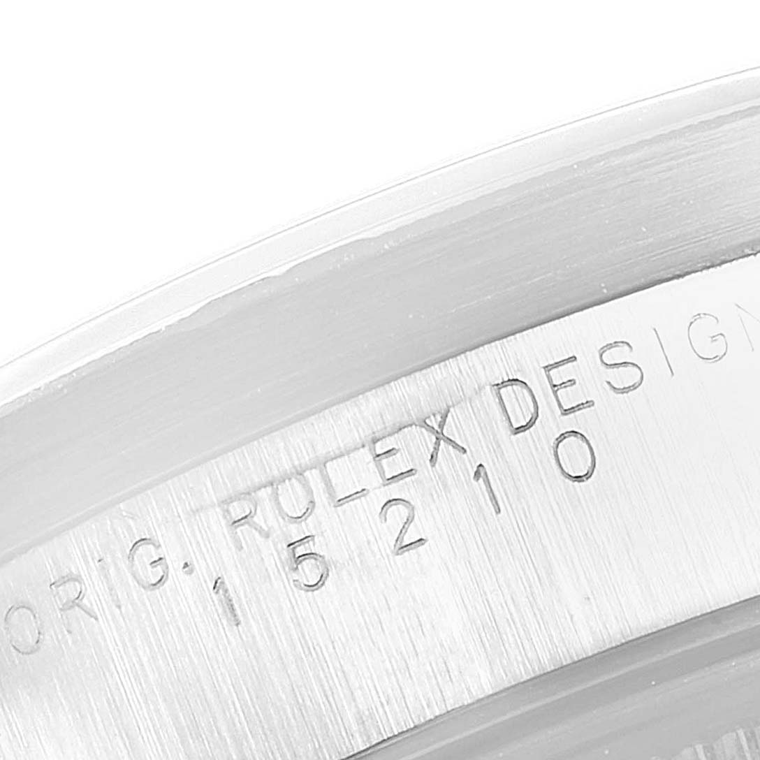 This image shows a close-up of the engraved model number on the casing of a Rolex Date 15210 Men's Stainless Steel White Dial 15210 Men's Stainless Steel White Dial watch.