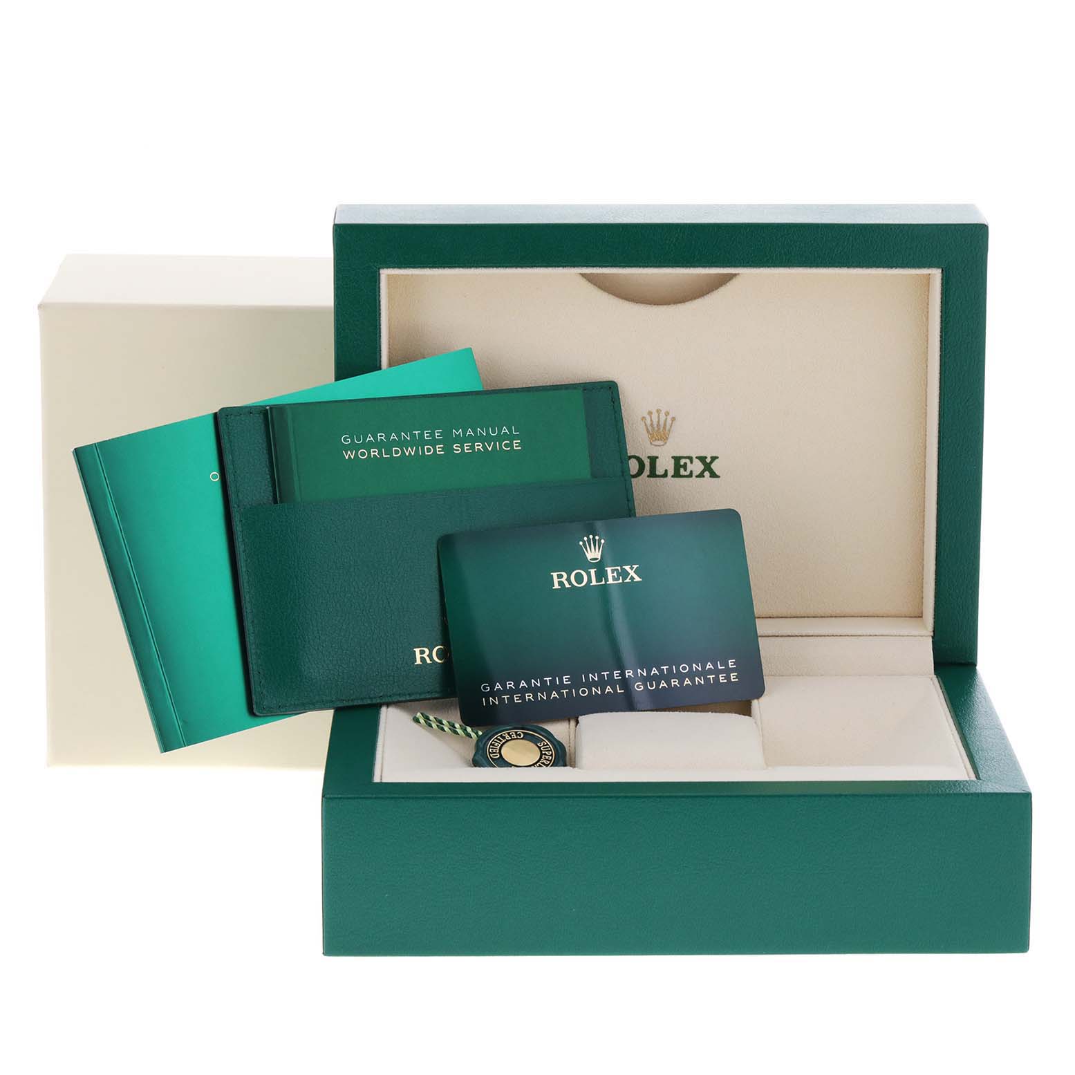 The image shows the accessories for a Rolex Datejust 279174 Women's Stainless Steel Grey Dial 279174 Women's Stainless Steel Grey Dial watch including the box, guarantee card, and manuals.