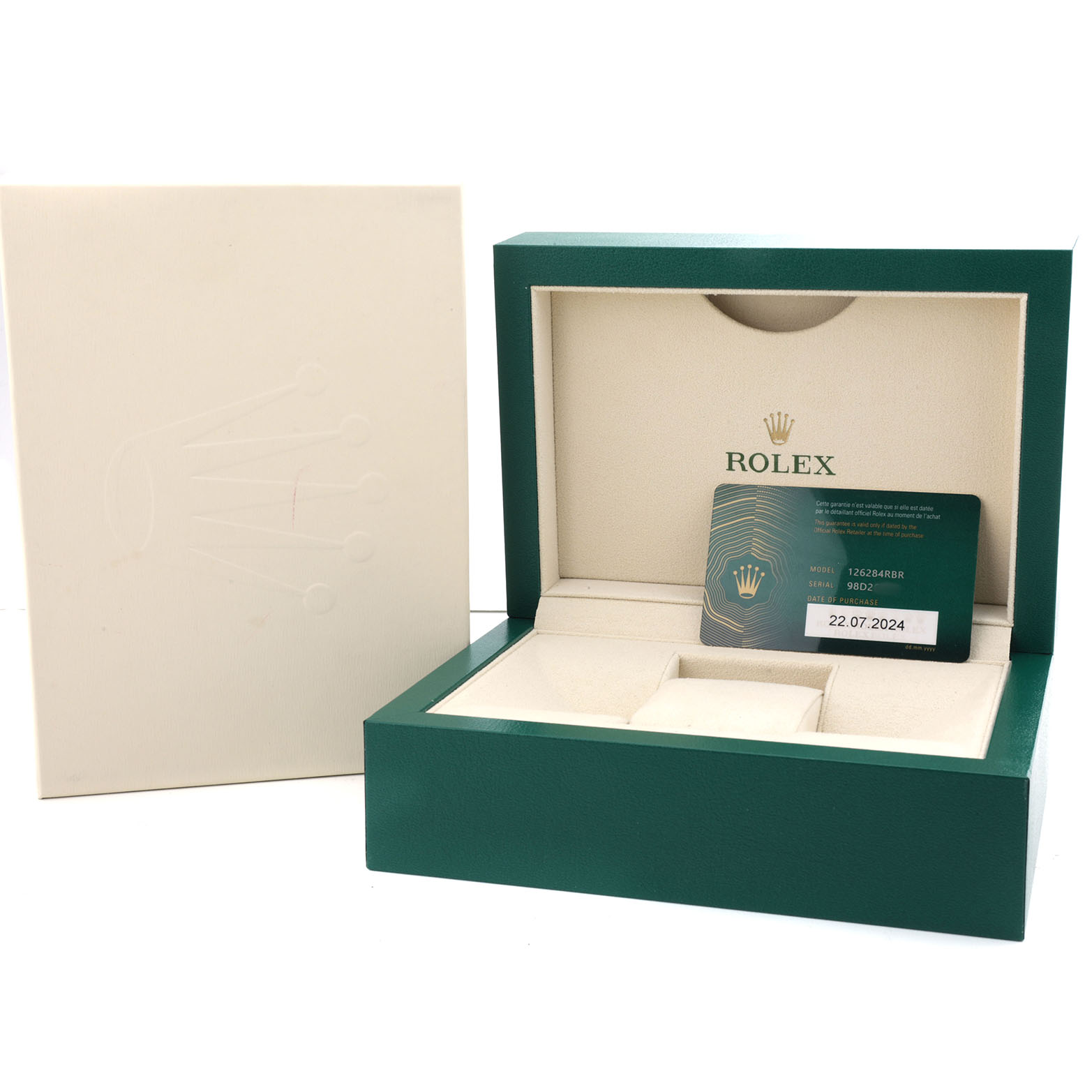 The image shows a Rolex Datejust 126284RBR Men's Stainless Steel Purple Dial packaging box and guarantee card from a front angle.